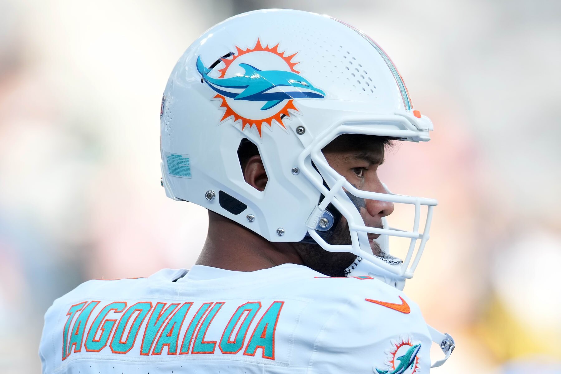 EAST RUTHERFORD, NEW JERSEY - NOVEMBER 24: Tua Tagovailoa #1 of the Miami Dolphins looks on prior to the game against the New York Jets at MetLife Stadium on November 24, 2023 in East Rutherford, New Jersey. (Photo by Mike Stobe/Getty Images)