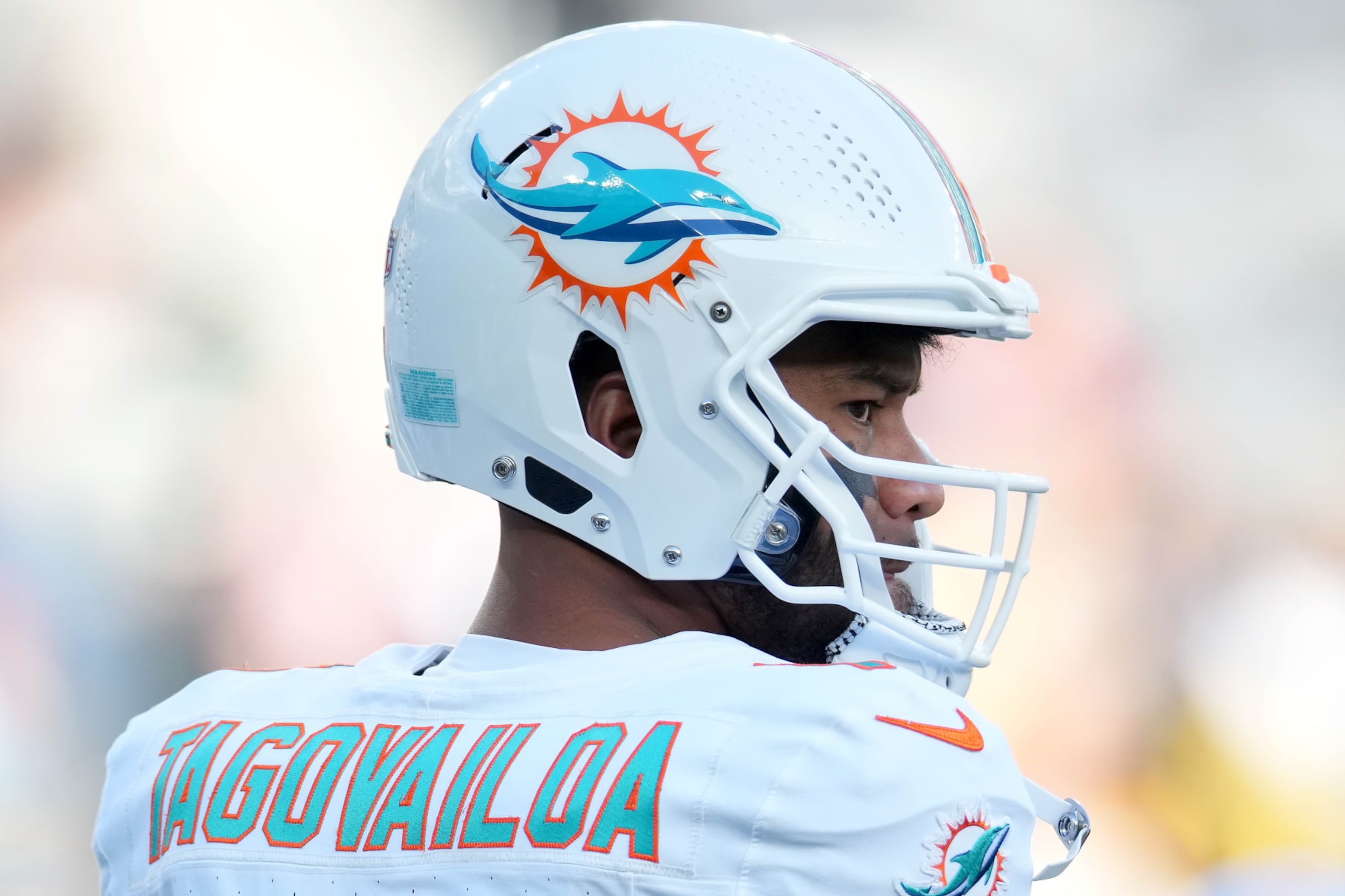EAST RUTHERFORD, NEW JERSEY - NOVEMBER 24: Tua Tagovailoa #1 of the Miami Dolphins looks on prior to the game against the New York Jets at MetLife Stadium on November 24, 2023 in East Rutherford, New Jersey. (Photo by Mike Stobe/Getty Images)