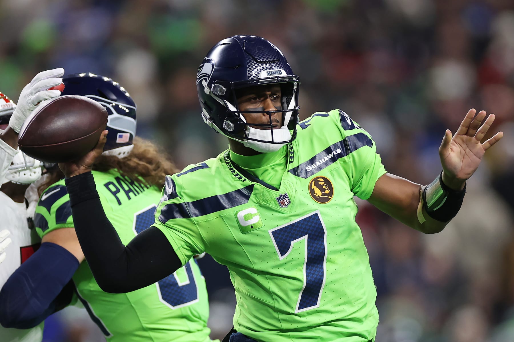 SEATTLE, WASHINGTON - NOVEMBER 23: Geno Smith #7 of the Seattle Seahawks throws a pass during the fourth quarter against the San Francisco 49ers at Lumen Field on November 23, 2023 in Seattle, Washington. (Photo by Steph Chambers/Getty Images)