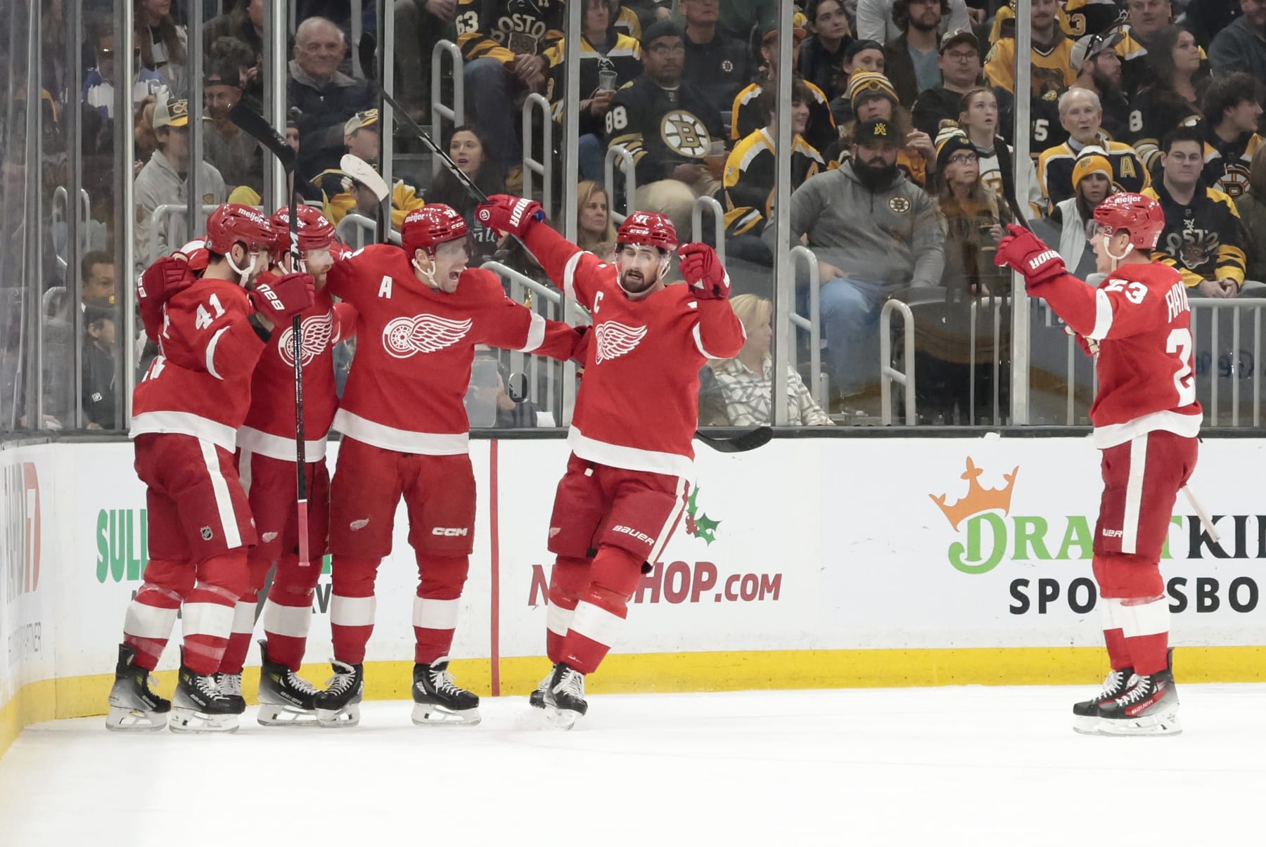 BOSTON, MA - NOVEMBER 24: Detroit celebrates an opening goal from Detroit Red Wings left wing J.T. Compher (37) on the power play during a game between the Boston Bruins and the Detroit Red Wings on November 24, 2023, at TD Garden in Boston, Massachusetts. (Photo by Fred Kfoury III/Icon Sportswire via Getty Images)