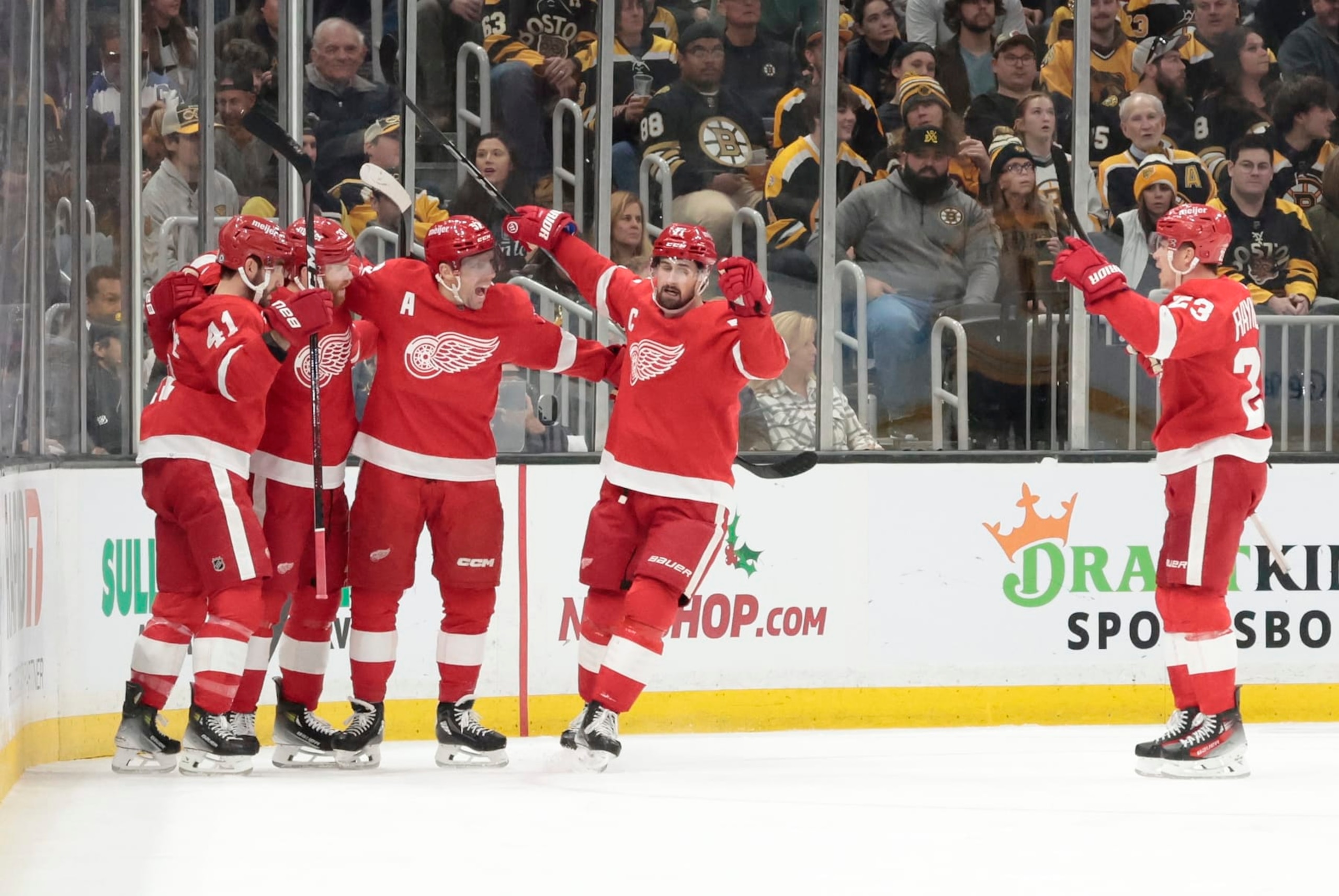 BOSTON, MA - NOVEMBER 24: Detroit celebrates an opening goal from Detroit Red Wings left wing J.T. Compher (37) on the power play during a game between the Boston Bruins and the Detroit Red Wings on November 24, 2023, at TD Garden in Boston, Massachusetts. (Photo by Fred Kfoury III/Icon Sportswire via Getty Images)