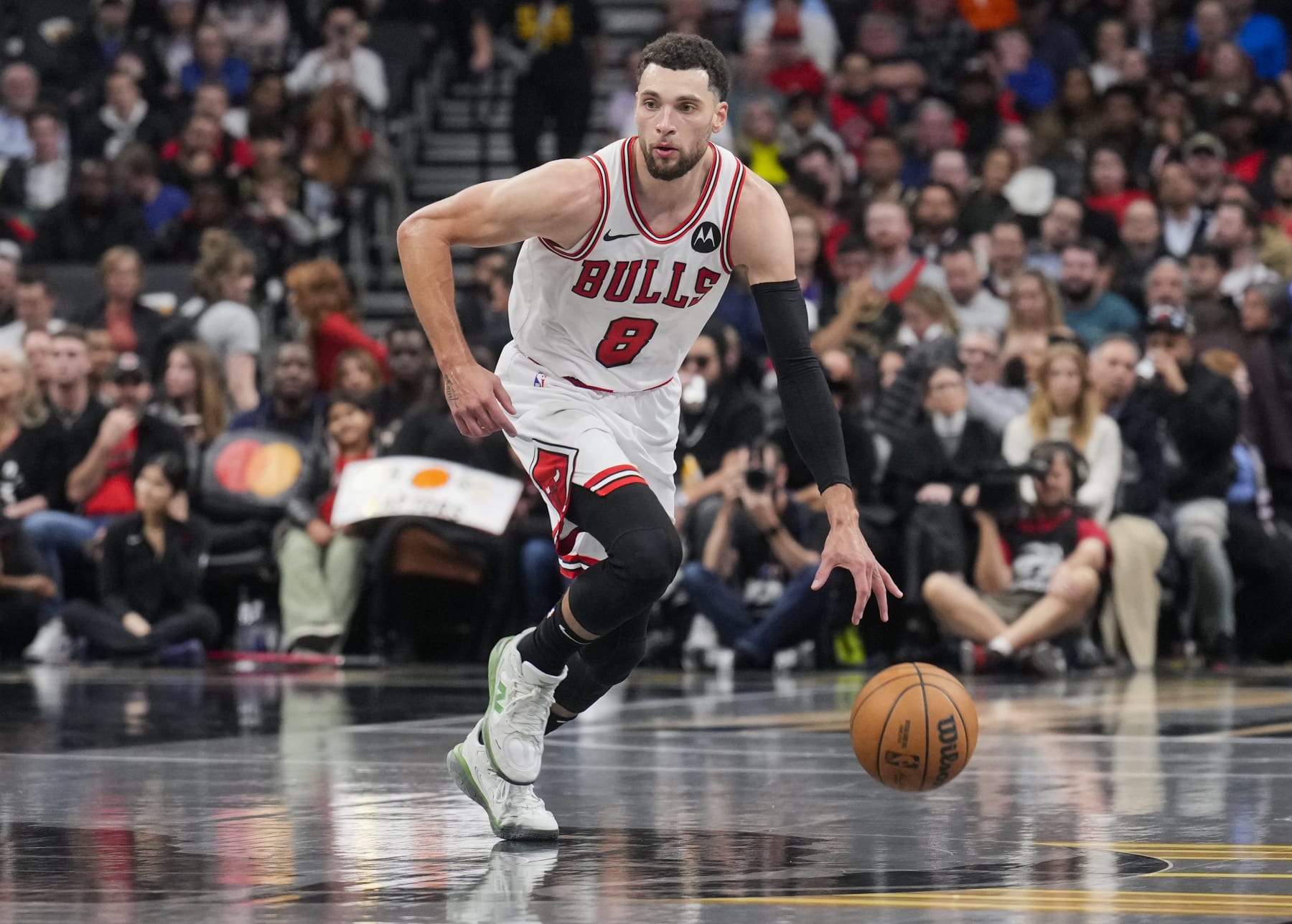 TORONTO, ON - NOVEMBER 24: Zach LaVine #8 of the Chicago Bulls dribbles against the Toronto Raptors during the second half of their NBA In-Season Tournament game at the Scotiabank Arena on November 24, 2023 in Toronto, Ontario, Canada. NOTE TO USER: User expressly acknowledges and agrees that, by downloading and/or using this Photograph, user is consenting to the terms and conditions of the Getty Images License Agreement. (Photo by Mark Blinch/Getty Images)
