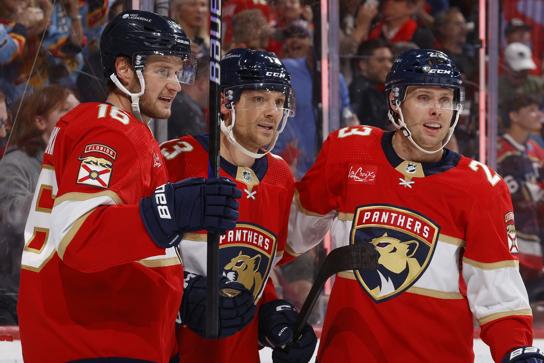 SUNRISE, FL - NOVEMBER 12: Teammates congratulate Sam Reinhart #13 of the Florida Panthers after he scored a first period goal against the Chicago Blackhawks at the Amerant Bank Arena on November 12, 2023 in Sunrise, Florida. (Photo by Joel Auerbach/Getty Images)