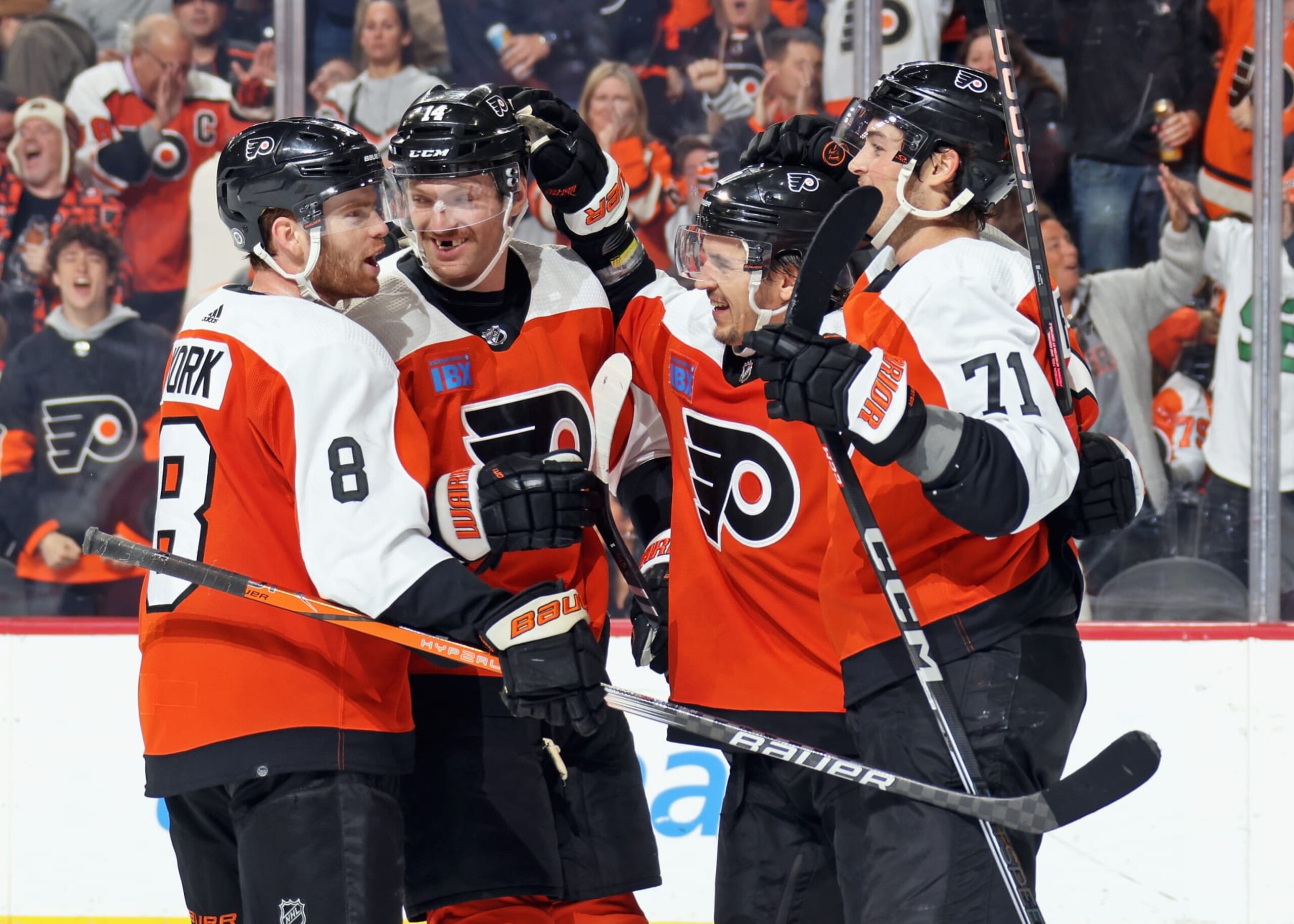 PHILADELPHIA, PENNSYLVANIA - NOVEMBER 19: Travis Konecny #11 of the Philadelphia Flyers celebrates his third period goal against the Columbus Blue Jackets with Cam York #8, Sean Couturier #14, and Tyson Foerster #71 at the Wells Fargo Center on November 19, 2023 in Philadelphia, Pennsylvania.  (Photo by Len Redkoles/NHLI via Getty Images)