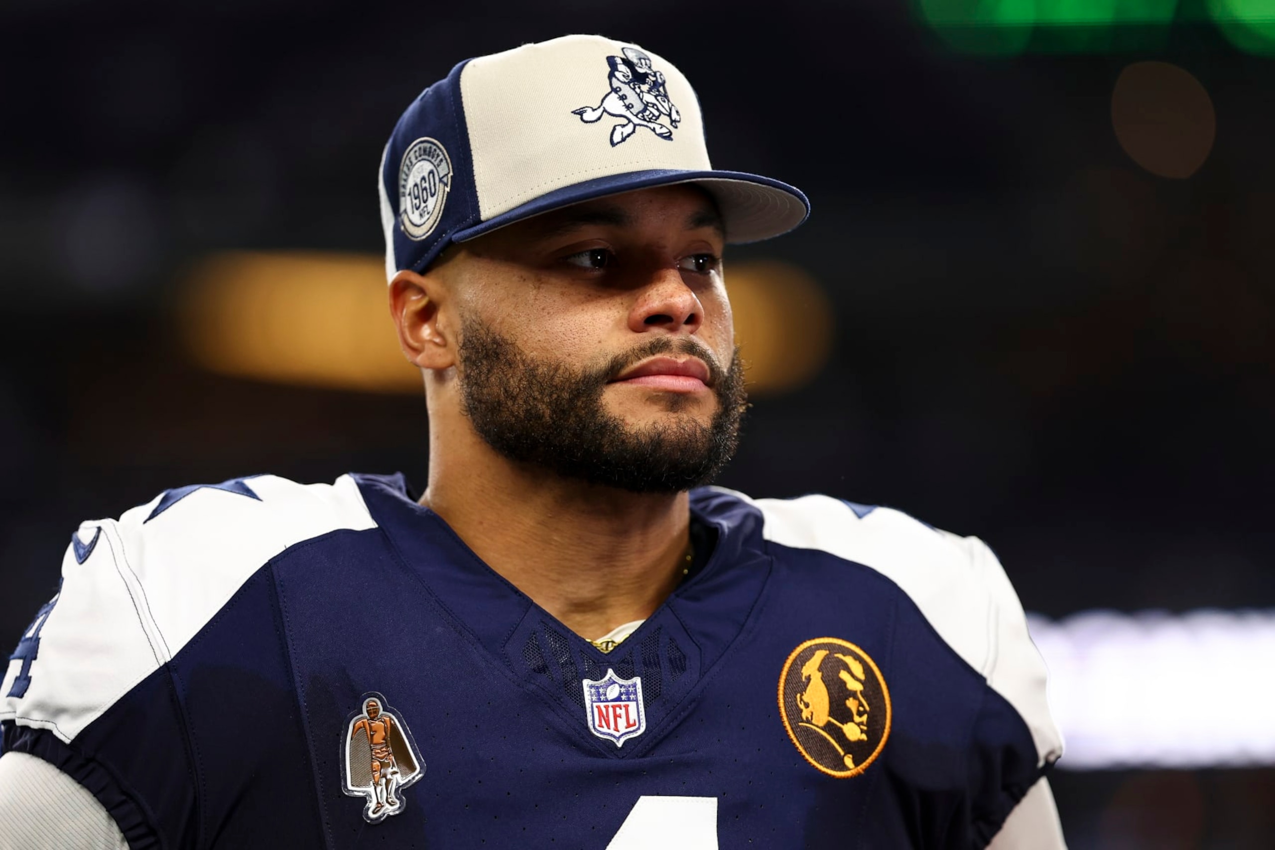ARLINGTON, TX - NOVEMBER 23: Dak Prescott #4 of the Dallas Cowboys looks on after an NFL football game against the Washington Commanders at AT&T Stadium on November 23, 2023 in Arlington, Texas. (Photo by Kevin Sabitus/Getty Images) ARLINGTON, TX - NOVEMBER 23: Dak Prescott #4 of the Dallas Cowboys looks on after an NFL football game against the Washington Commanders at AT&T Stadium on November 23, 2023 in Arlington, Texas. (Photo by Kevin Sabitus/Getty Images)