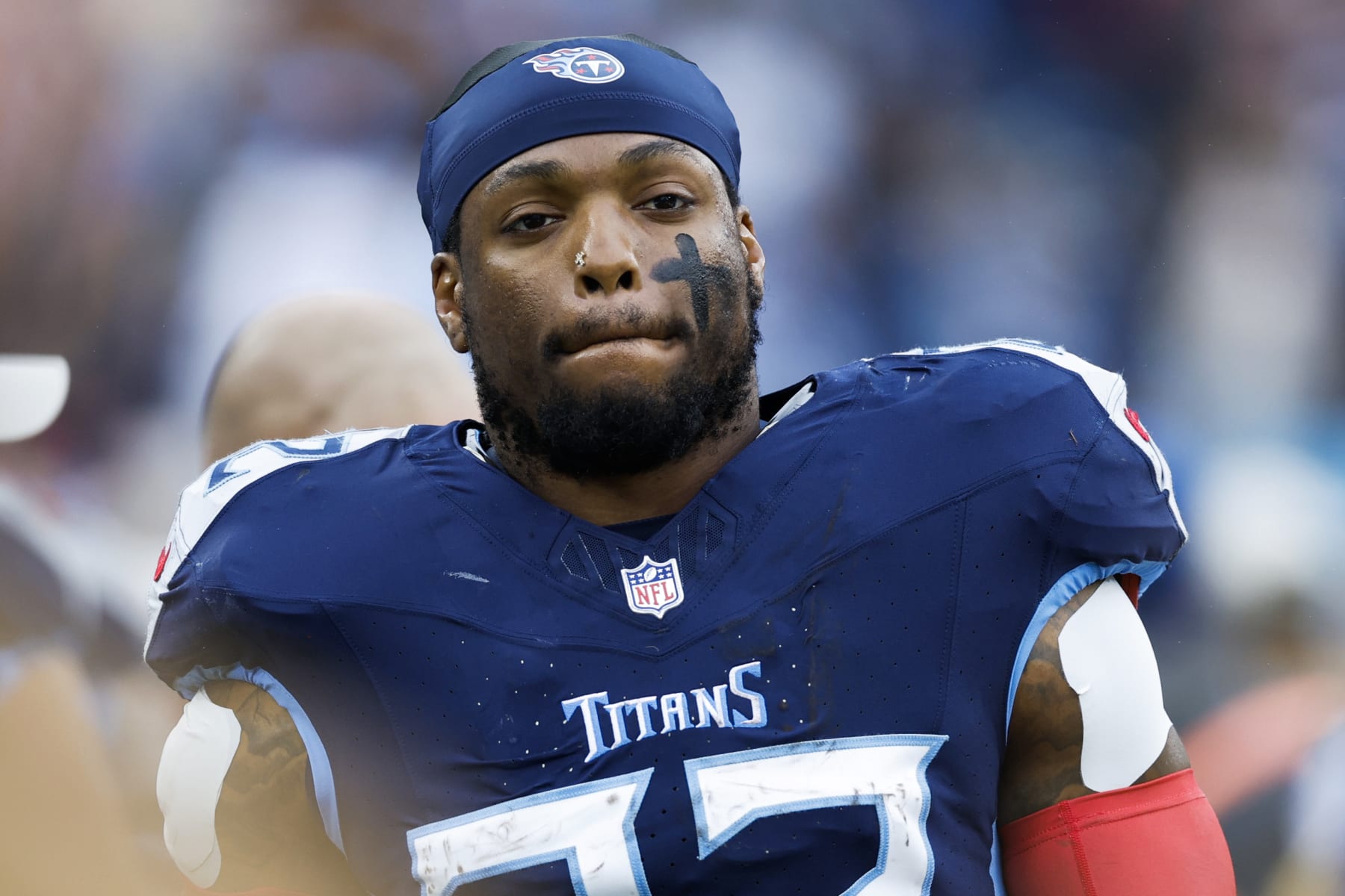 NASHVILLE, TENNESSEE - NOVEMBER 26: Derrick Henry #22 of the Tennessee Titans looks on during the first half against the Carolina Panthers at Nissan Stadium on November 26, 2023 in Nashville, Tennessee. (Photo by Wesley Hitt/Getty Images)