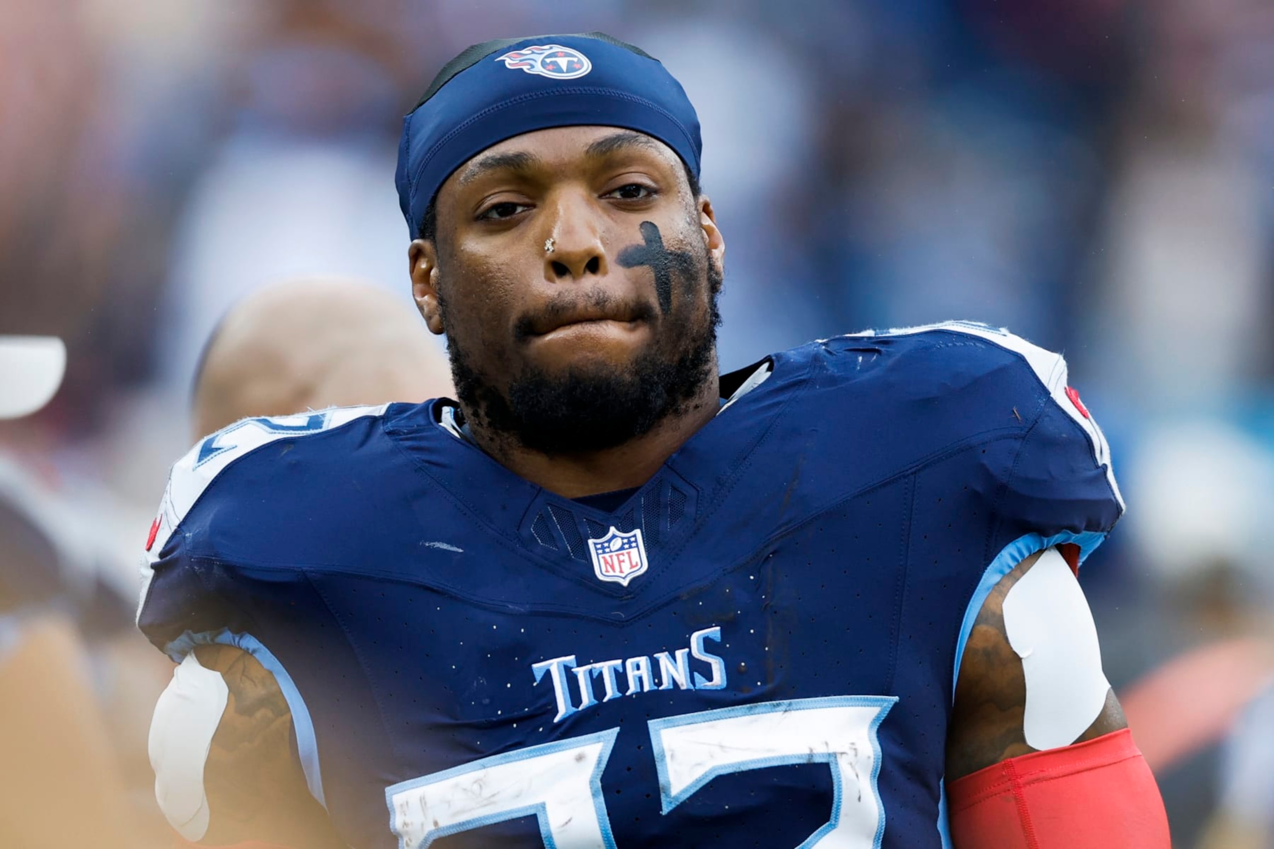 NASHVILLE, TENNESSEE - NOVEMBER 26: Derrick Henry #22 of the Tennessee Titans looks on during the first half against the Carolina Panthers at Nissan Stadium on November 26, 2023 in Nashville, Tennessee. (Photo by Wesley Hitt/Getty Images)