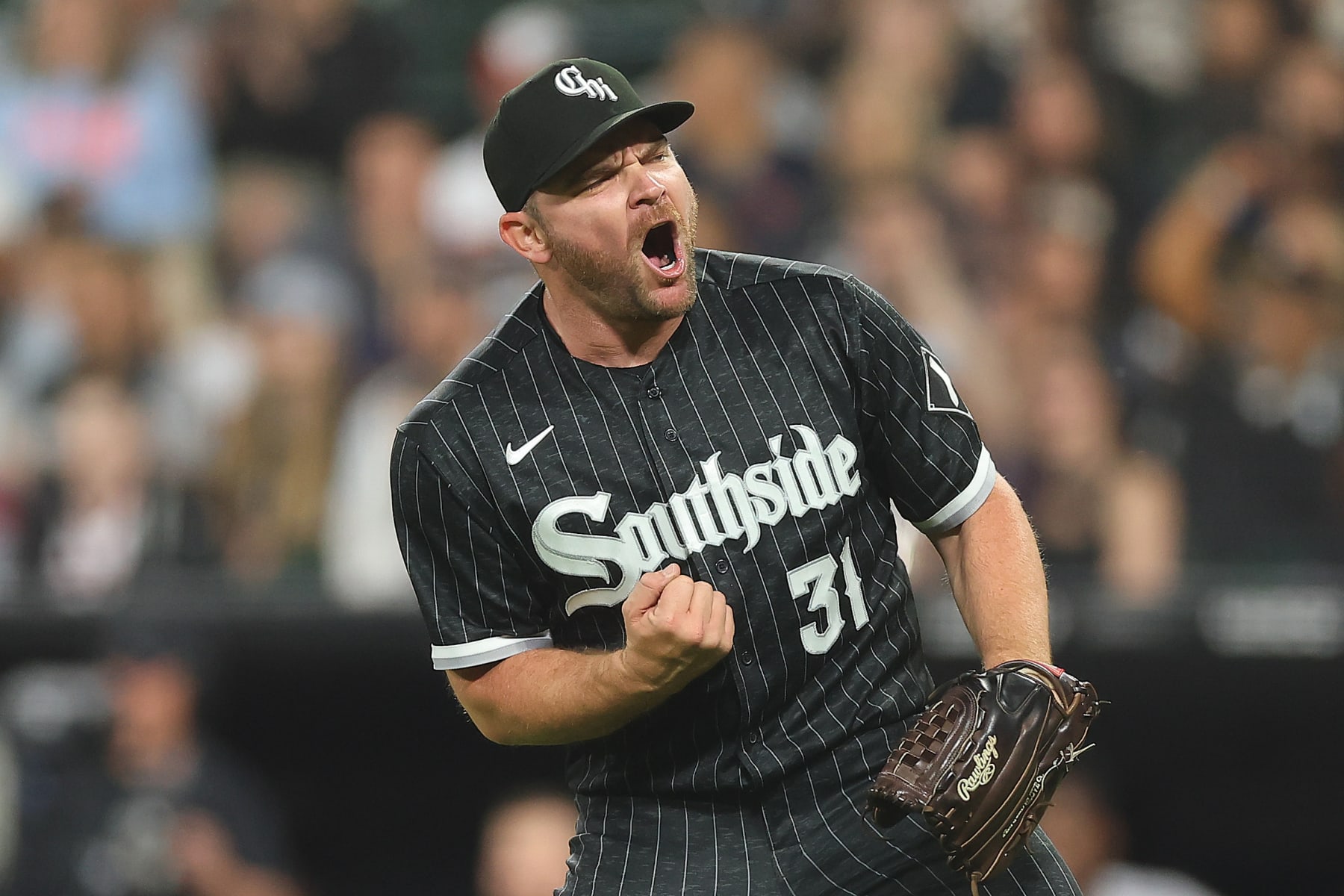 CHICAGO, ILLINOIS - JUNE 09: Liam Hendriks #31 of the Chicago White Sox celebrates the third out during the ninth inning against the Miami Marlins at Guaranteed Rate Field on June 09, 2023 in Chicago, Illinois. (Photo by Michael Reaves/Getty Images)