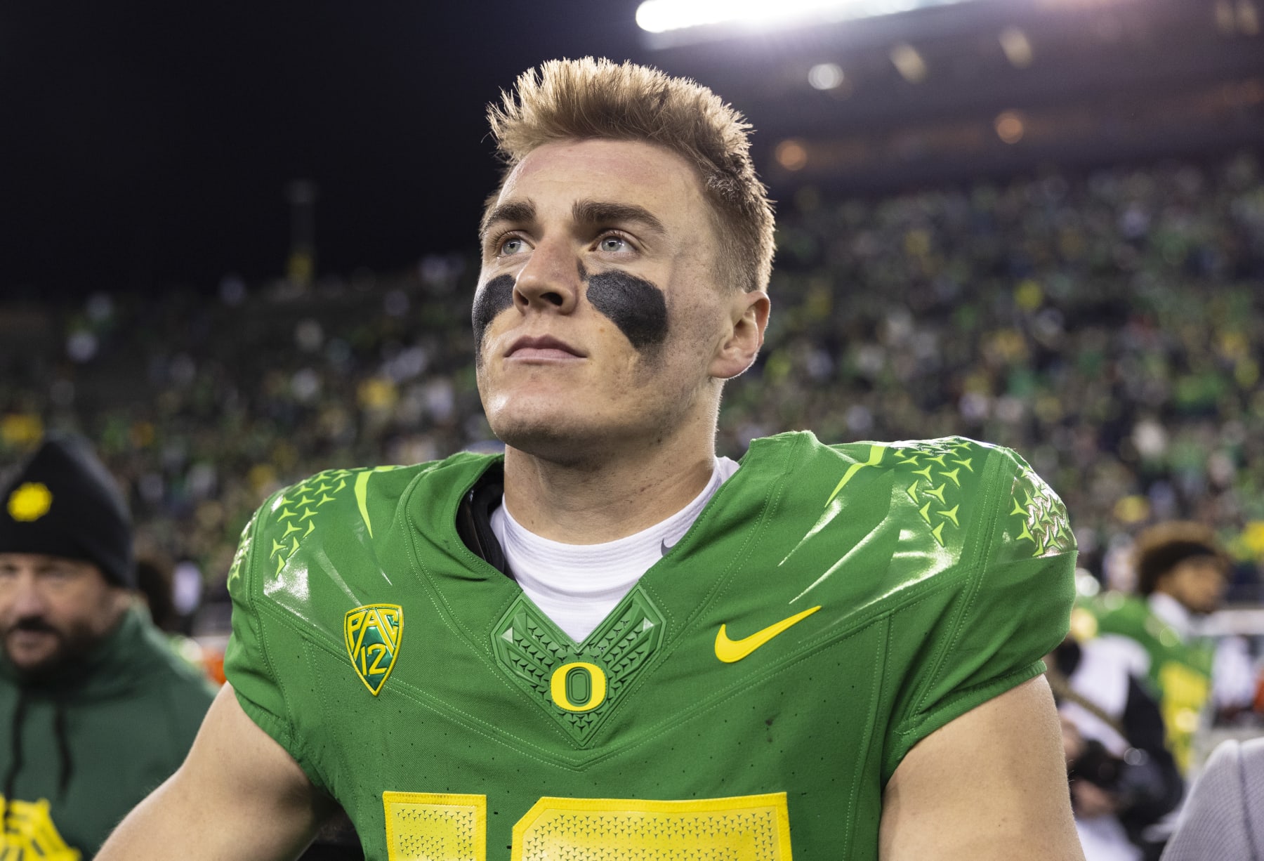 EUGENE, OREGON - NOVEMBER 24: Quarterback Bo Nix #10 of the Oregon Ducks celebrates after defeating the Oregon State Beavers 31-7 at Autzen Stadium on November 24, 2023 in Eugene, Oregon. (Photo by Tom Hauck/Getty Images)