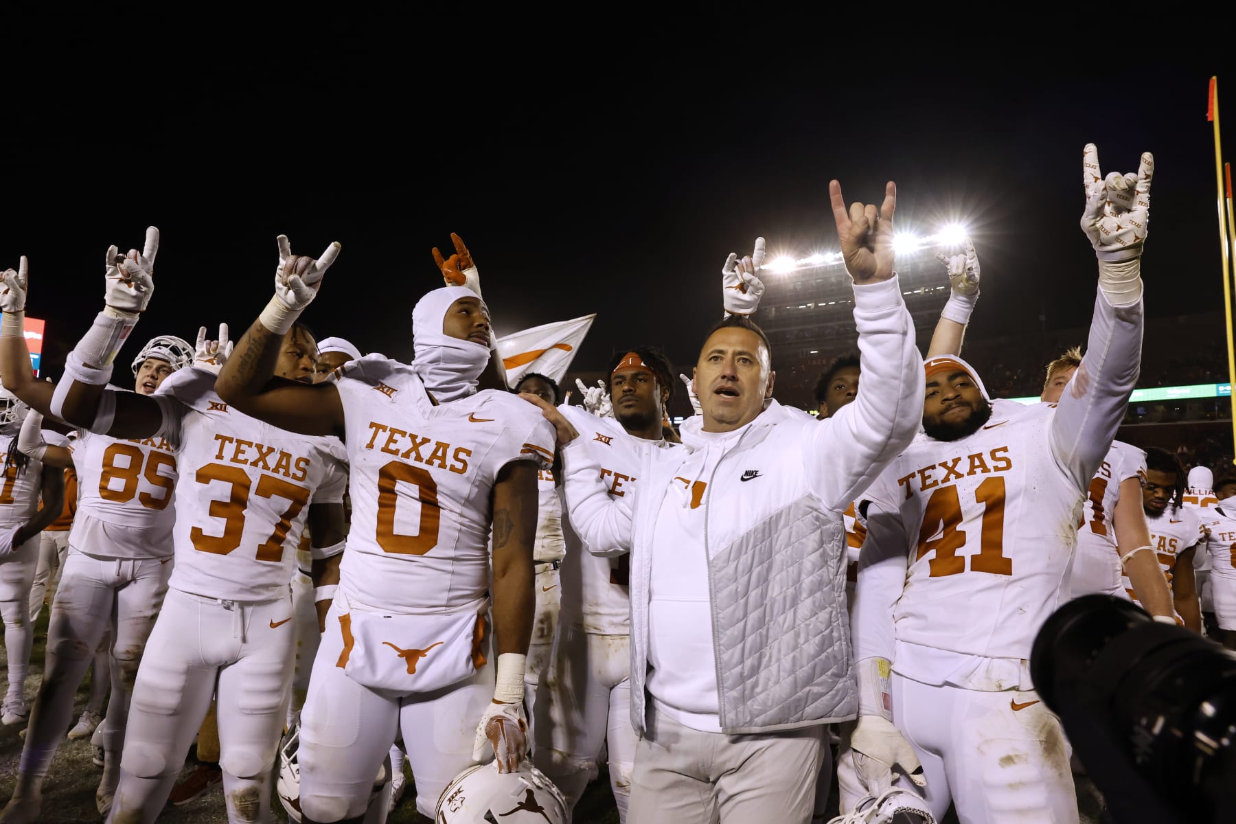 AMES, IA - NOVEMBER 18: Steve Sarkisian head coach of the Texas Longhorns celebrates with his team and Texas Longhorns fans after winning 26-16 over the Iowa State Cyclones at Jack Trice Stadium on November 18, 2023 in Ames, Iowa. The Texas Longhorns won 26-16 over the Iowa State Cyclones. (Photo by David K Purdy/Getty Images)
