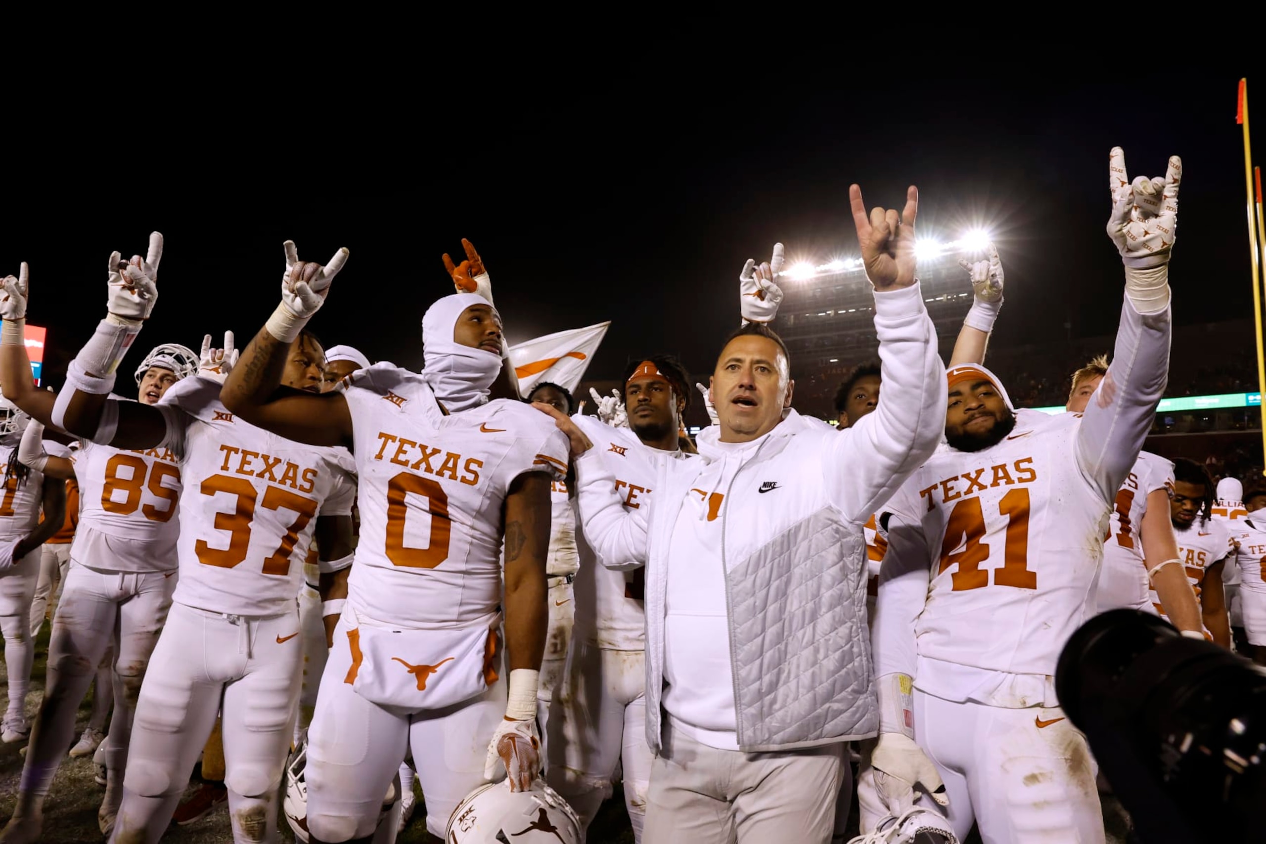 AMES, IA - NOVEMBER 18: Steve Sarkisian head coach of the Texas Longhorns celebrates with his team and Texas Longhorns fans after winning 26-16 over the Iowa State Cyclones at Jack Trice Stadium on November 18, 2023 in Ames, Iowa. The Texas Longhorns won 26-16 over the Iowa State Cyclones. (Photo by David K Purdy/Getty Images)