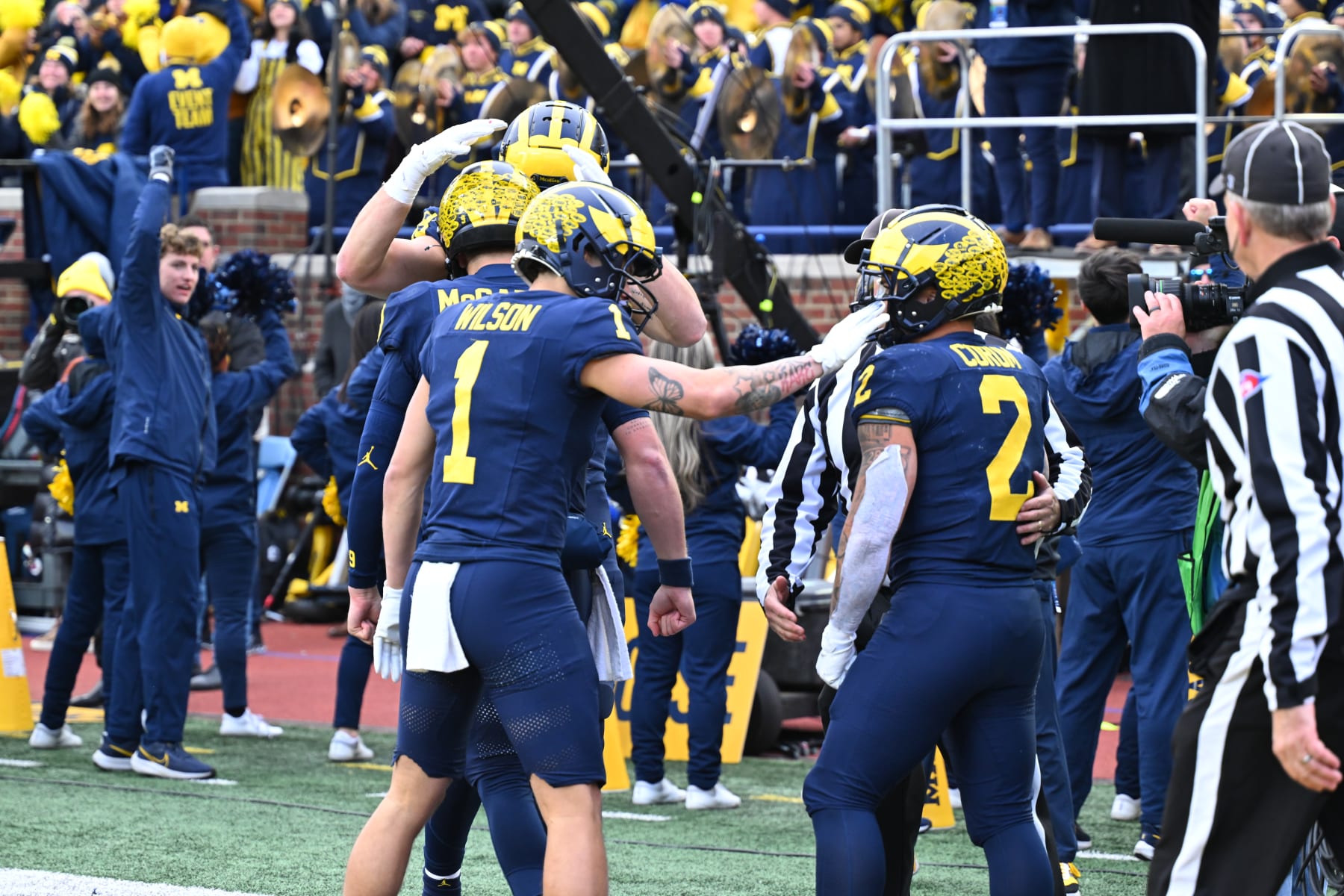 ANN ARBOR, MI - NOVEMBER 25: Michigan Wolverines wide receiver Roman Wilson (1) congratulates Michigan Wolverines running back Blake Corum (2) on his touchdown run during the Michigan Wolverines versus the Ohio State Buckeyes on Saturday November 25, 2023 at Michigan Stadium in Ann Arbor, MI. (Photo by Steven King/Icon Sportswire via Getty Images)