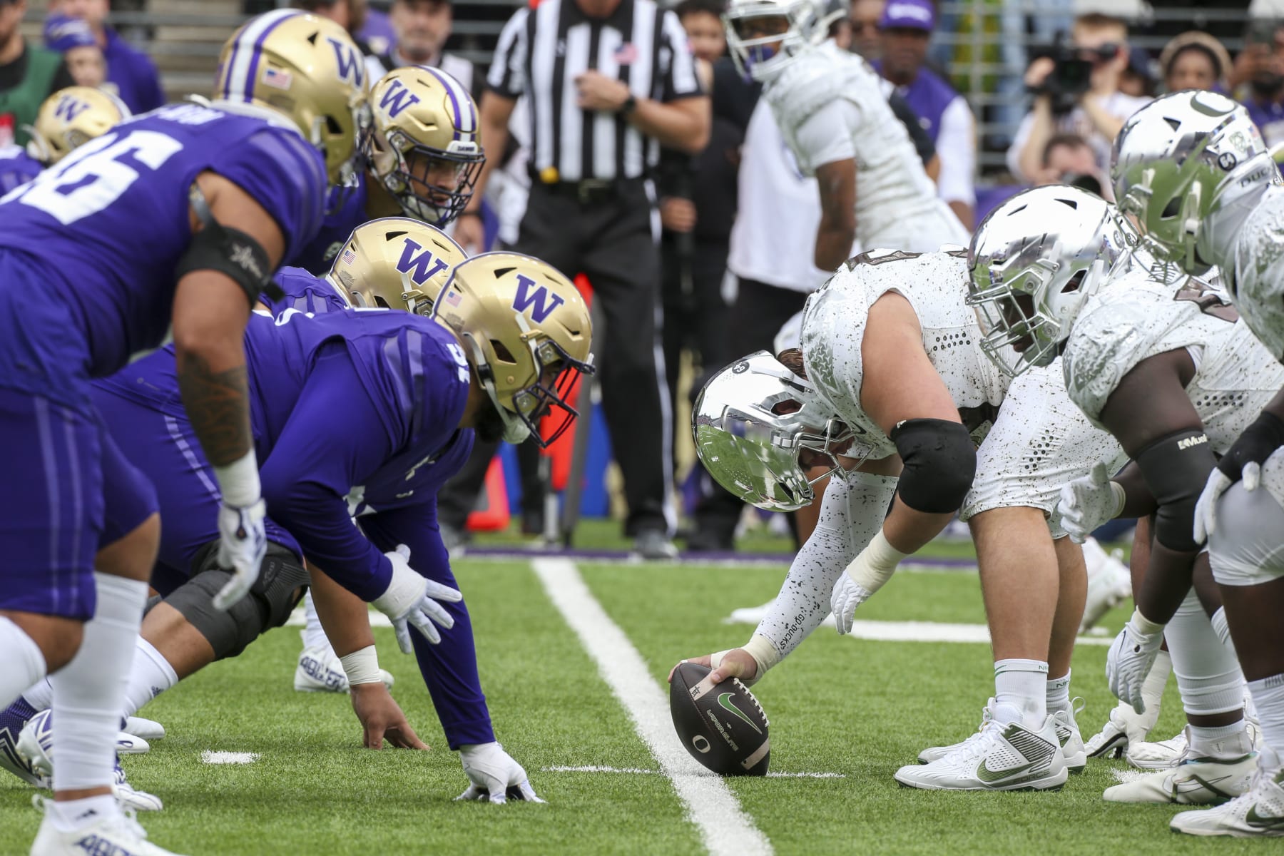 SEATTLE, WA - OCTOBER 14:  Offensive and defense players get set during a college football game between the Washington Huskies and the Oregon Ducks on October 14, 2023 at Husky Stadium in Seattle, WA. (Photo by Jesse Beals/Icon Sportswire via Getty Images)