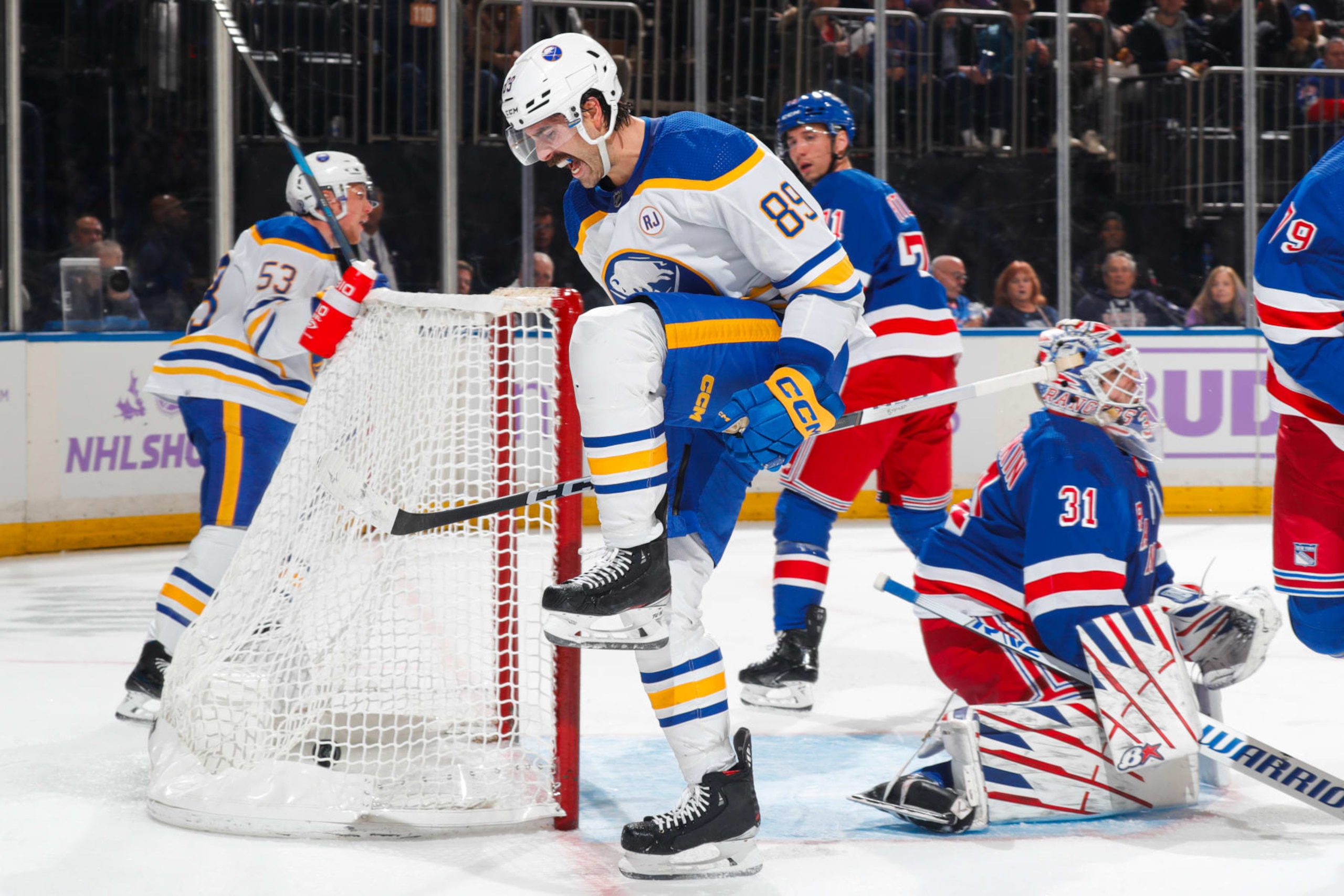 NEW YORK, NEW YORK - NOVEMBER 27:  Alex Tuch #89 of the Buffalo Sabres celebrates after scoring a goal in the second period against the New York Rangers at Madison Square Garden on November 27, 2023 in New York City. (Photo by Jared Silber/NHLI via Getty Images)