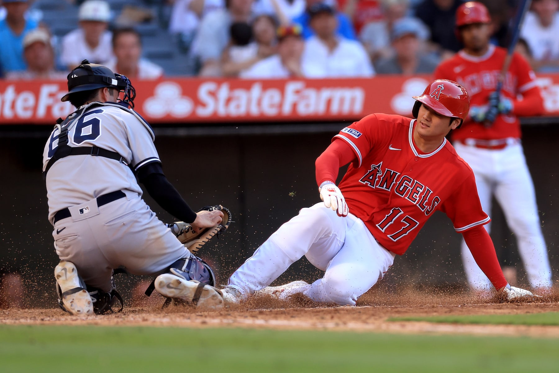 ANAHEIM, CALIFORNIA - JULY 19: Kyle Higashioka #66 of the New York Yankees tags out Shohei Ohtani #17 of the Los Angeles Angels during the eighth inning of a game at Angel Stadium of Anaheim on July 19, 2023 in Anaheim, California. (Photo by Sean M. Haffey/Getty Images)