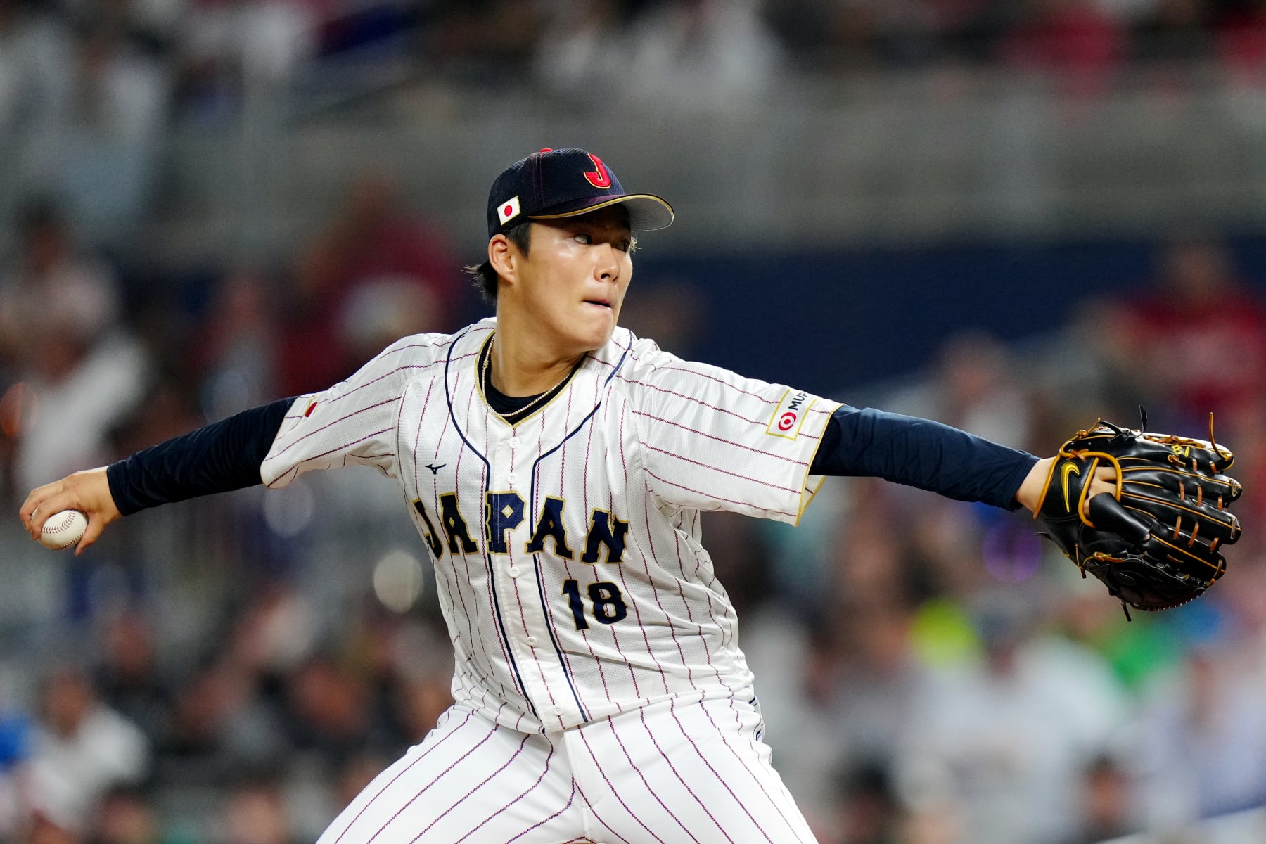 MIAMI, FL - MARCH 20:  Yoshinobu Yamamoto #18 of Team Japan pitches during the 2023 World Baseball Classic Semifinal game between Team Mexico and Team Japan at loanDepot Park on Monday, March 20, 2023 in Miami, Florida. (Photo by Daniel Shirey/WBCI/MLB Photos via Getty Images)