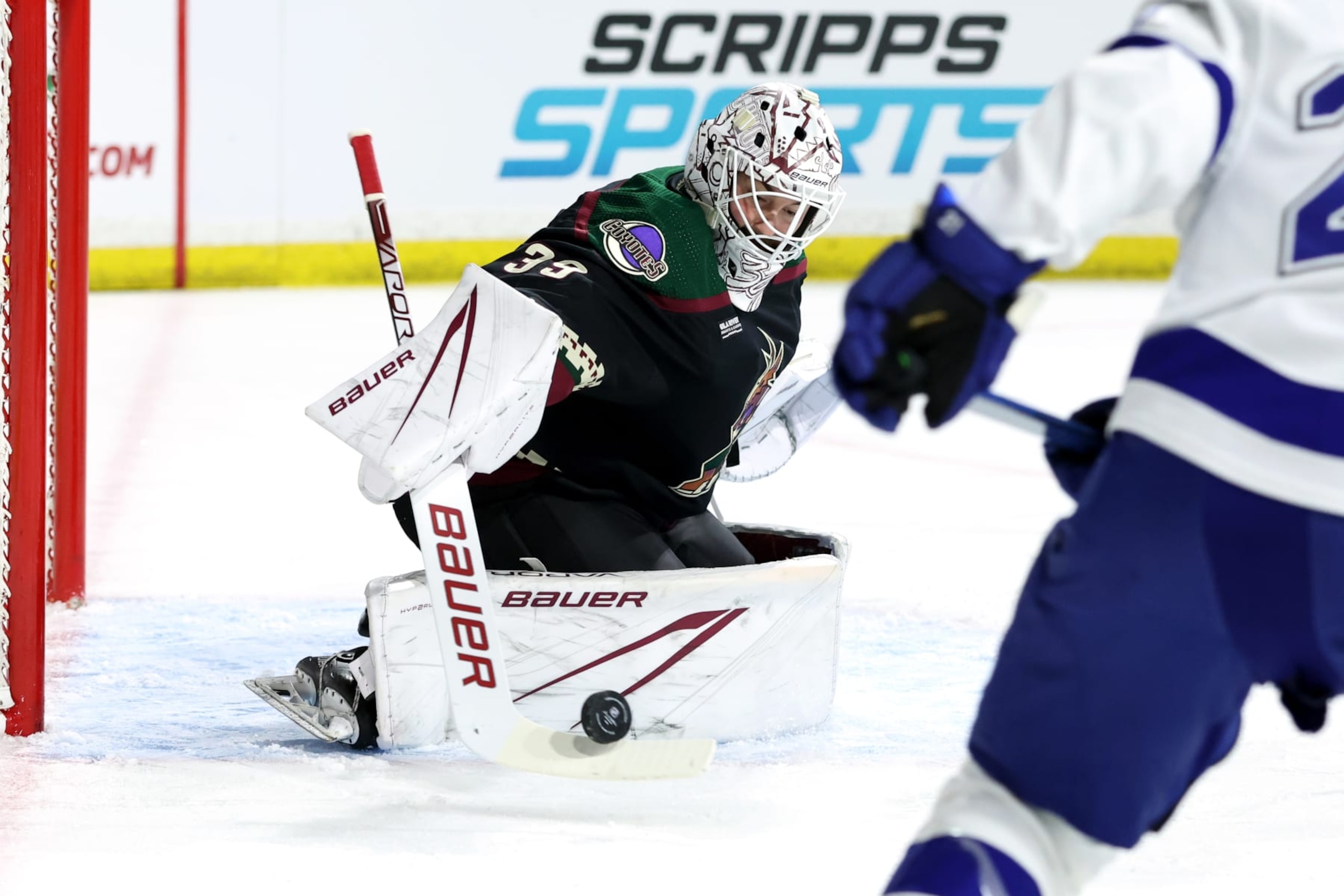 TEMPE, ARIZONA - NOVEMBER 28: Connor Ingram #39 of the Arizona Coyotes makes a save against the Tampa Bay Lightning during the first period at Mullett Arena on November 28, 2023 in Tempe, Arizona. (Photo by Zac BonDurant/Getty Images)