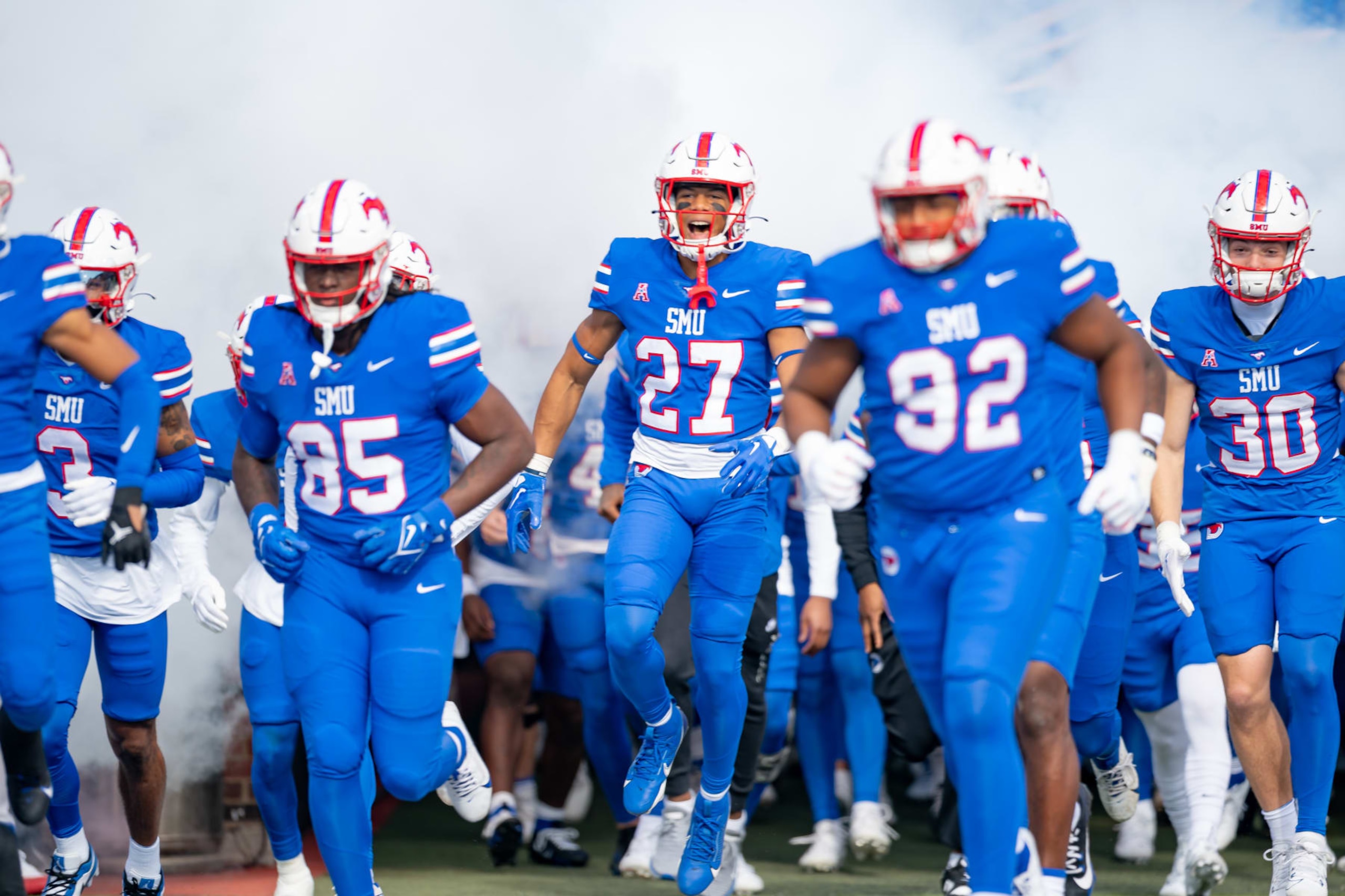 DALLAS, TX - NOVEMBER 25: Southern Methodist Mustangs running back Zane Minors (27) runs out of the tunnel before a college football game between the Navy Midshipmen and Southern Methodist Mustangs on November 25, 2023 at Gerald Ford Stadium in Dallas, TX.  (Photo by Chris Leduc/Icon Sportswire via Getty Images)