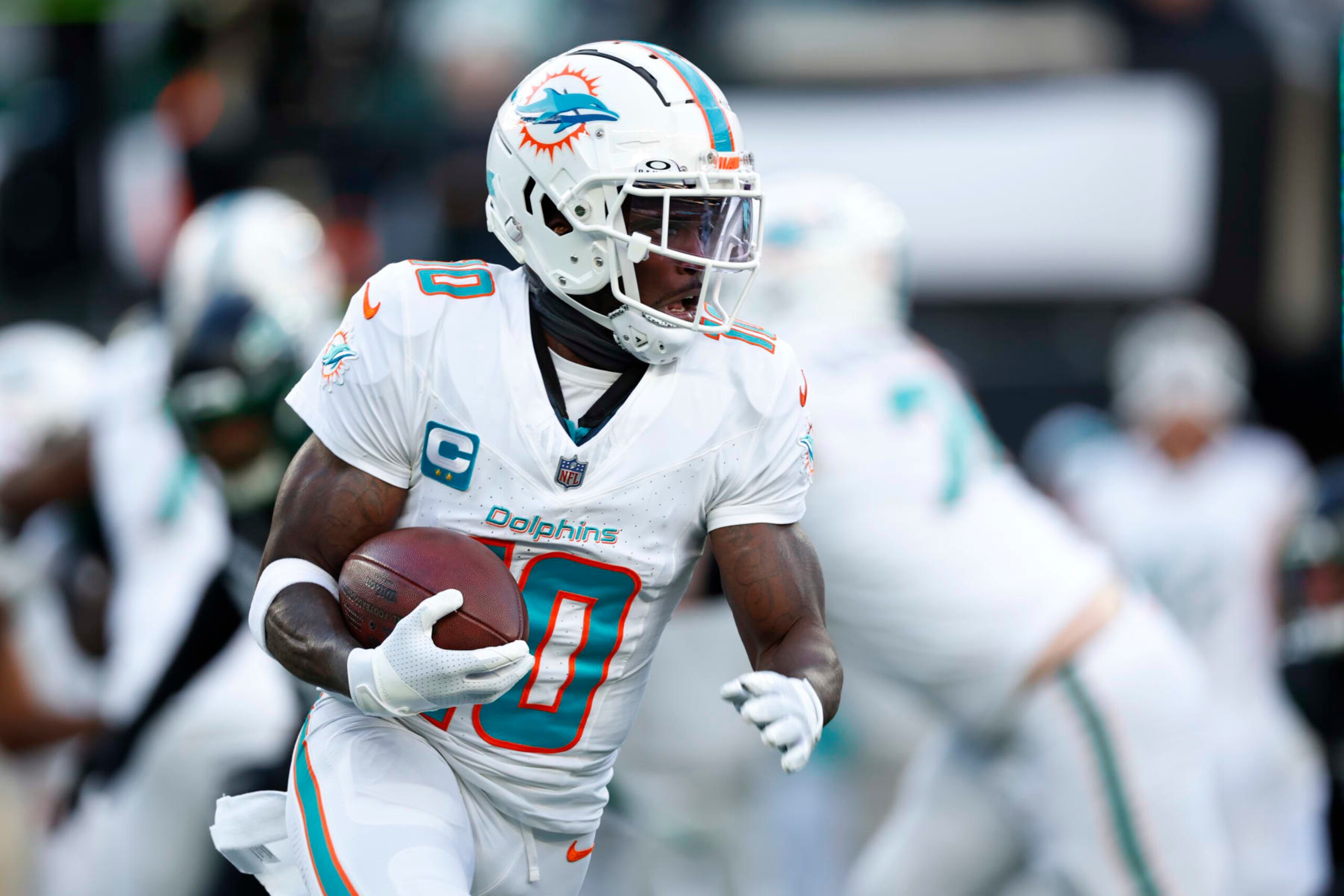 EAST RUTHERFORD, NEW JERSEY - NOVEMBER 24: Wide receiver Tyreek Hill #10 of the Miami Dolphins in action against the New York Jets during a football game at MetLife Stadium on November 24, 2023 in East Rutherford, New Jersey. (Photo by Rich Schultz/Getty Images)