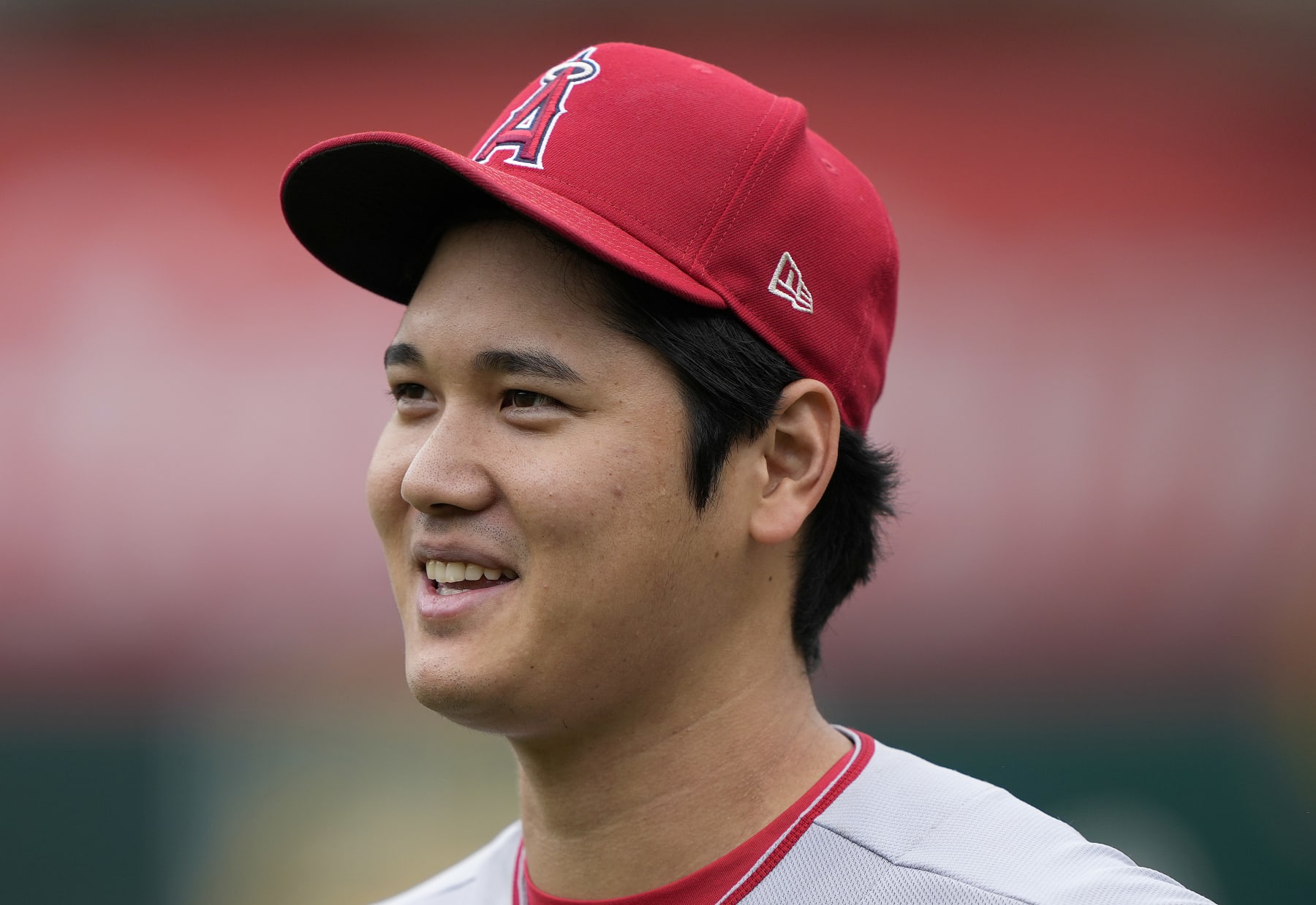 OAKLAND, CALIFORNIA - SEPTEMBER 02: Shohei Ohtani #17 of the Los Angeles Angels walks back to the dugout after warming up prior to the start of his game against the Oakland Athletics at RingCentral Coliseum on September 02, 2023 in Oakland, California. (Photo by Thearon W. Henderson/Getty Images)