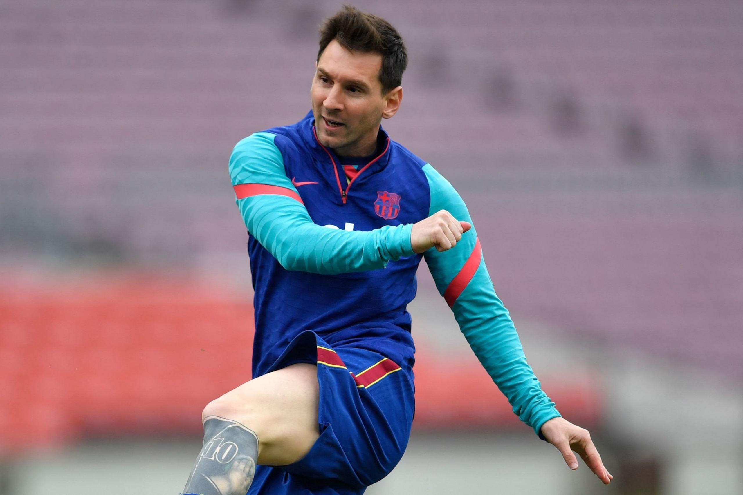 Barcelona's Argentine forward Lionel Messi warms up before the Spanish League football match between FC Barcelona ans RC Celta de Vigo at the Camp Nou stadium in Barcelona on May 16, 2021. (Photo by Pau BARRENA / AFP) (Photo by PAU BARRENA/AFP via Getty Images) Barcelona's Argentine forward Lionel Messi warms up before the Spanish League football match between FC Barcelona ans RC Celta de Vigo at the Camp Nou stadium in Barcelona on May 16, 2021. (Photo by Pau BARRENA / AFP) (Photo by PAU BARRENA/AFP via Getty Images)