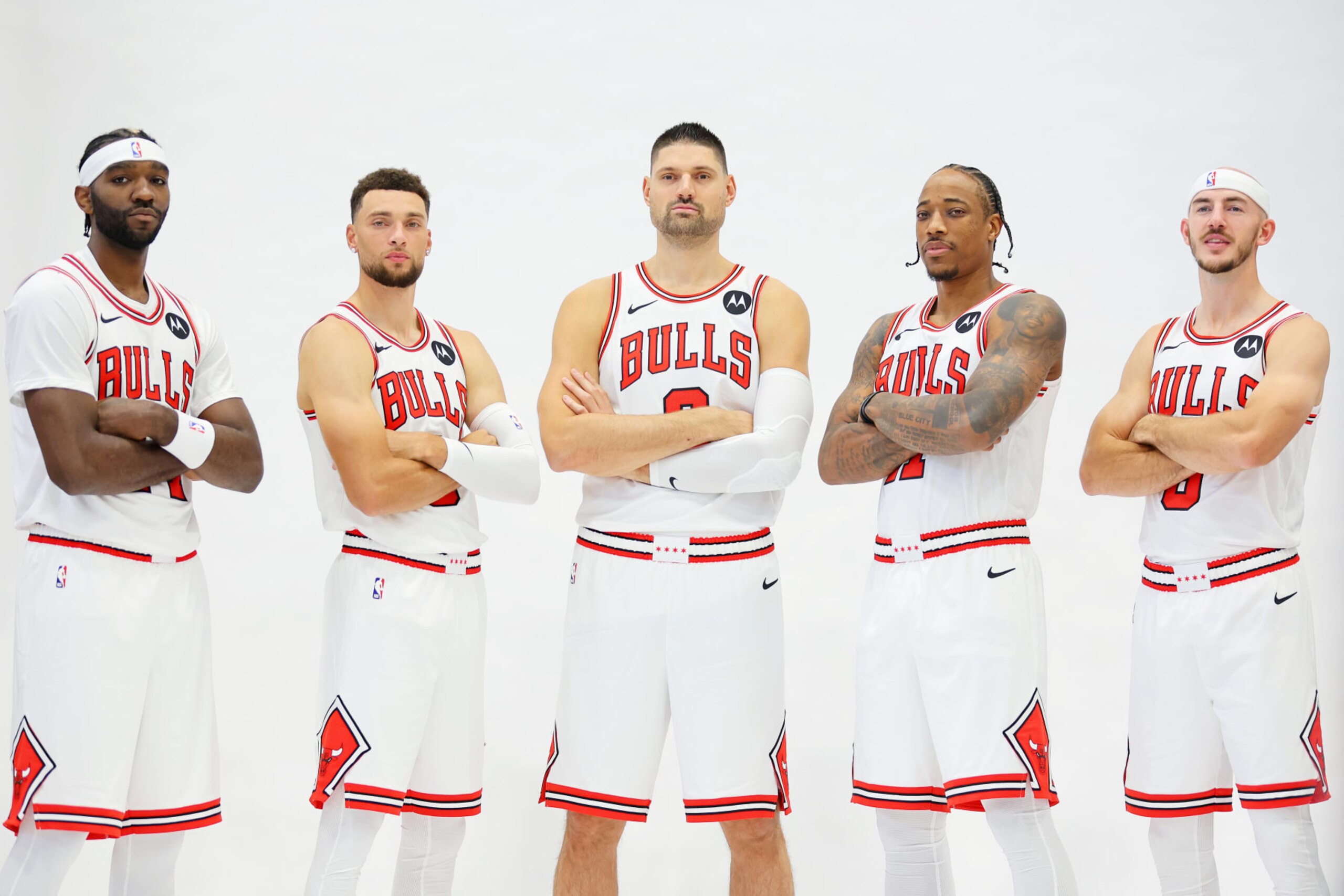 CHICAGO, ILLINOIS - OCTOBER 02: Patrick Williams #44, Zach LaVine #8, Nikola Vucevic #9, DeMar DeRozan #11 and Alex Caruso #6 of the Chicago Bulls pose for a photo during Media Day at Advocate Center on October 02, 2023 in Chicago, Illinois. (Photo by Michael Reaves/Getty Images)
