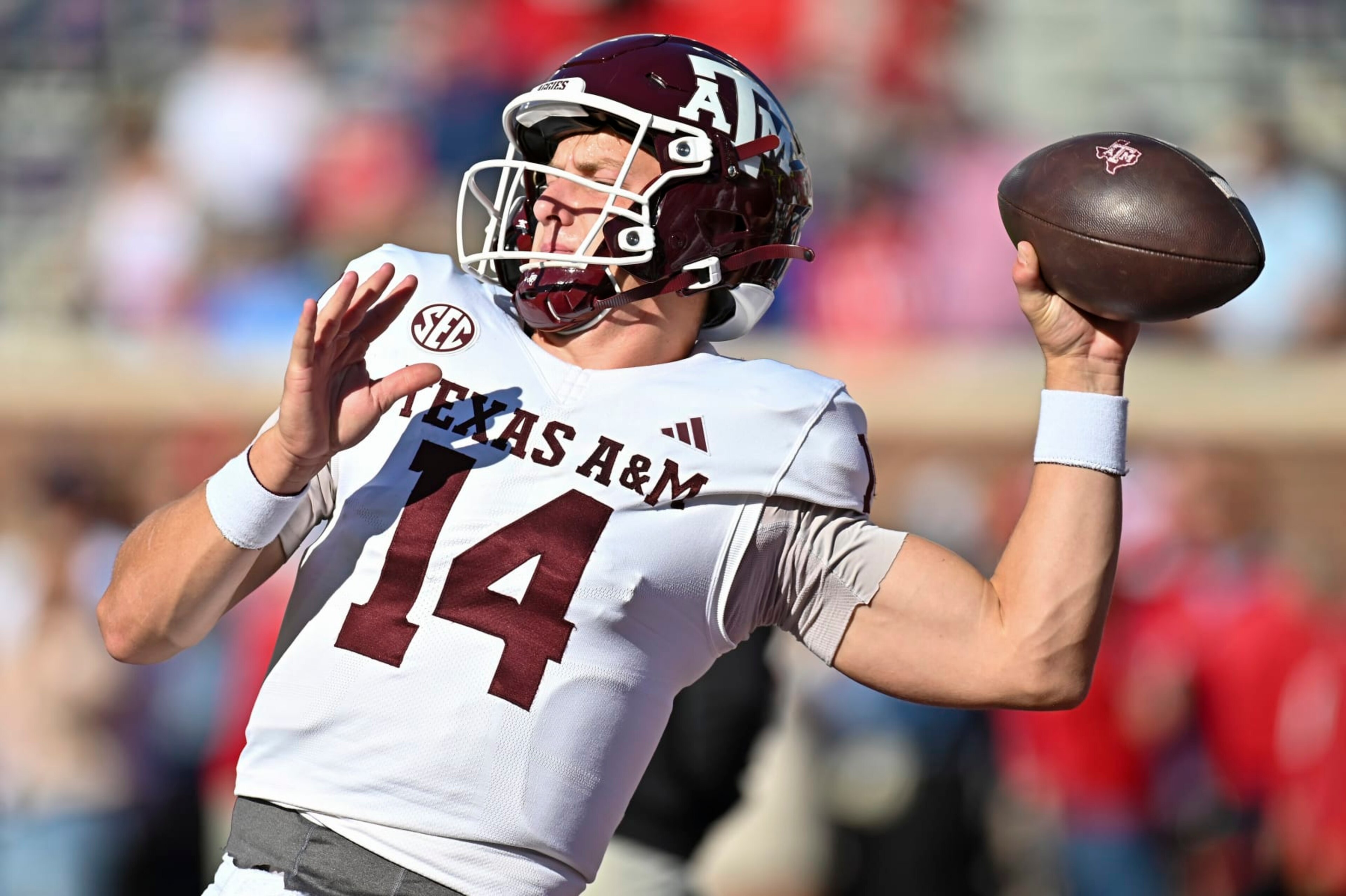 OXFORD, MS - NOVEMBER 04: Texas A&M quarterback Max Johnson (14) in action during the college football game between the Texas A&M Aggies and the Ole' Miss Rebels on November 04, 2023 at Vaught-Hemingway Stadium in Oxford, MS. (Photo by Kevin Langley/Icon Sportswire via Getty Images) OXFORD, MS - NOVEMBER 04: Texas A&M quarterback Max Johnson (14) in action during the college football game between the Texas A&M Aggies and the Ole' Miss Rebels on November 04, 2023 at Vaught-Hemingway Stadium in Oxford, MS. (Photo by Kevin Langley/Icon Sportswire via Getty Images)