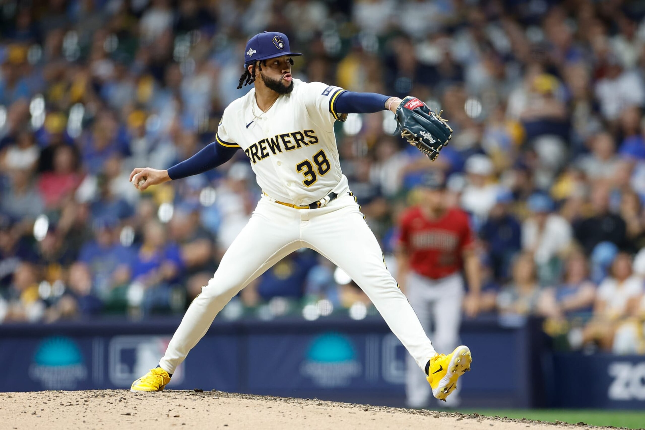 MILWAUKEE, WISCONSIN - OCTOBER 03: Devin Williams #38 of the Milwaukee Brewers throws a pitch against the Arizona Diamondbacks during Game One of the Wild Card Series at American Family Field on October 03, 2023 in Milwaukee, Wisconsin. (Photo by John Fisher/Getty Images)