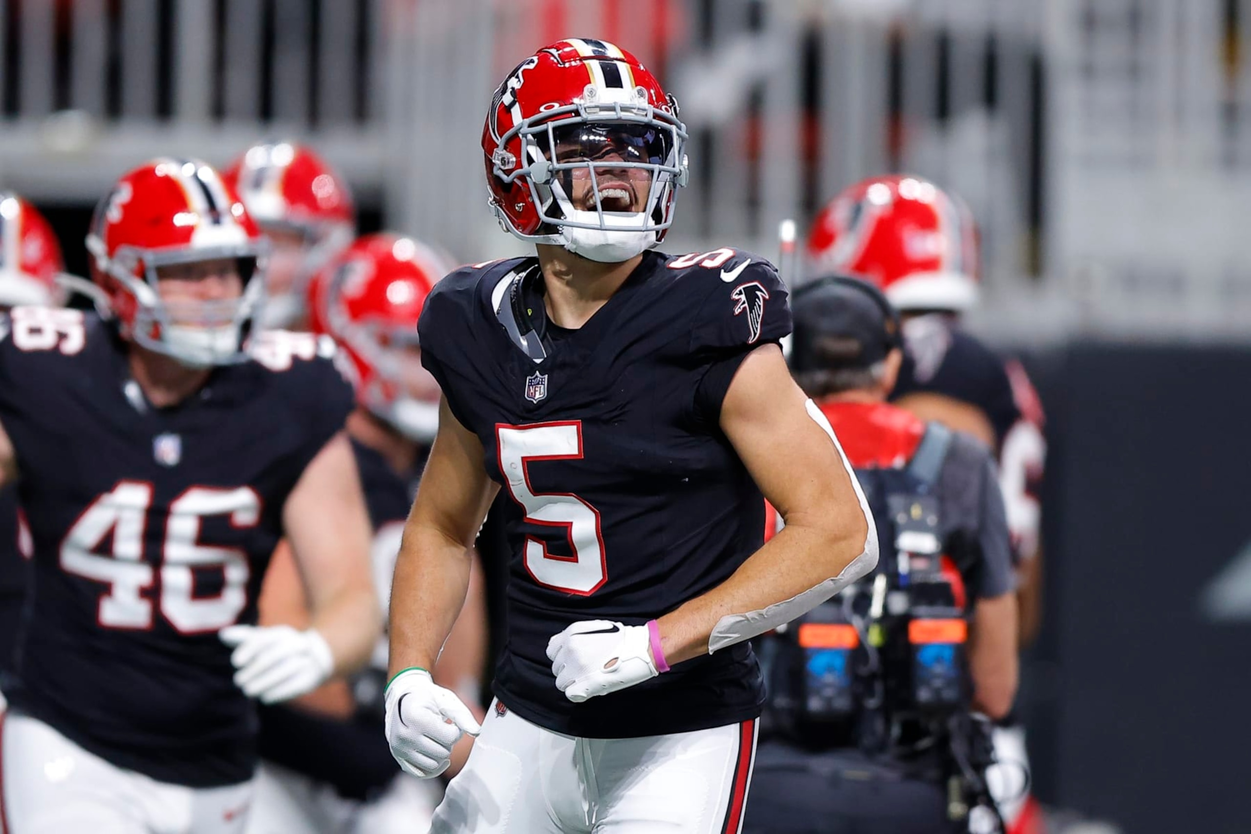 ATLANTA, GEORGIA - NOVEMBER 26: Drake London #5 of the Atlanta Falcons reacts after a Falcons touchdown during the second quarter against the New Orleans Saints at Mercedes-Benz Stadium on November 26, 2023 in Atlanta, Georgia. (Photo by Todd Kirkland/Getty Images)