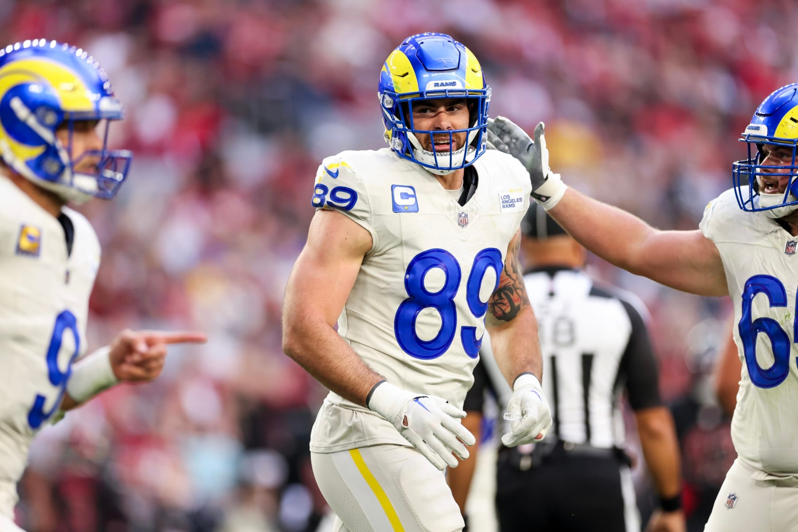 GLENDALE, ARIZONA - NOVEMBER 26: Tyler Higbee #89 of the Los Angeles Rams reacts after his receiving touchdown during the second quarter against the Arizona Cardinals at State Farm Stadium on November 26, 2023 in Glendale, Arizona. (Photo by Christian Petersen/Getty Images)
