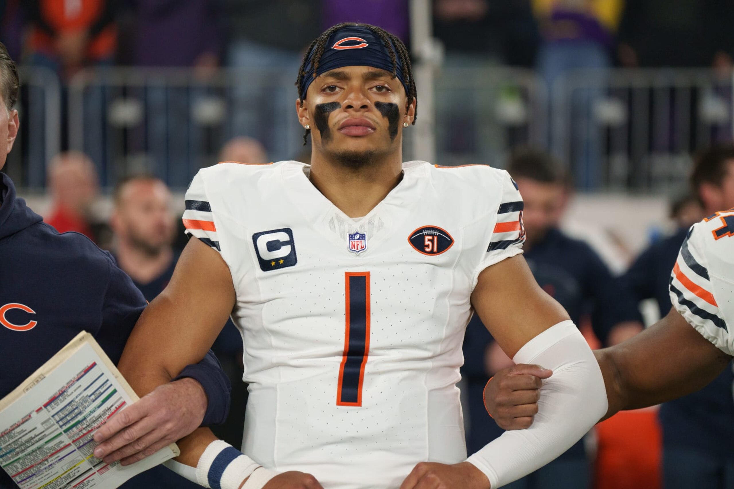 MINNEAPOLIS, MINNESOTA - NOVEMBER 27: Quarterback Justin Fields #1 of the Chicago Bears stands during the national anthem prior to an NFL football game against the Minnesota Vikings at U.S. Bank Stadium on November 27, 2023 in Minneapolis, Minnesota. (Photo by Todd Rosenberg/Getty Images) MINNEAPOLIS, MINNESOTA - NOVEMBER 27: Quarterback Justin Fields #1 of the Chicago Bears stands during the national anthem prior to an NFL football game against the Minnesota Vikings at U.S. Bank Stadium on November 27, 2023 in Minneapolis, Minnesota. (Photo by Todd Rosenberg/Getty Images)