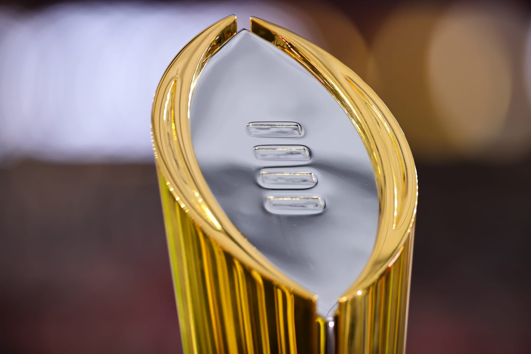 INGLEWOOD, CA - JANUARY 09: The College Football Playoff National Championship Trophy sits on the field before the game between the Georgia Bulldogs and the TCU Horned Frogs held at SoFi Stadium on January 9, 2023 in Inglewood, California. (Photo by Jamie Schwaberow/Getty Images)