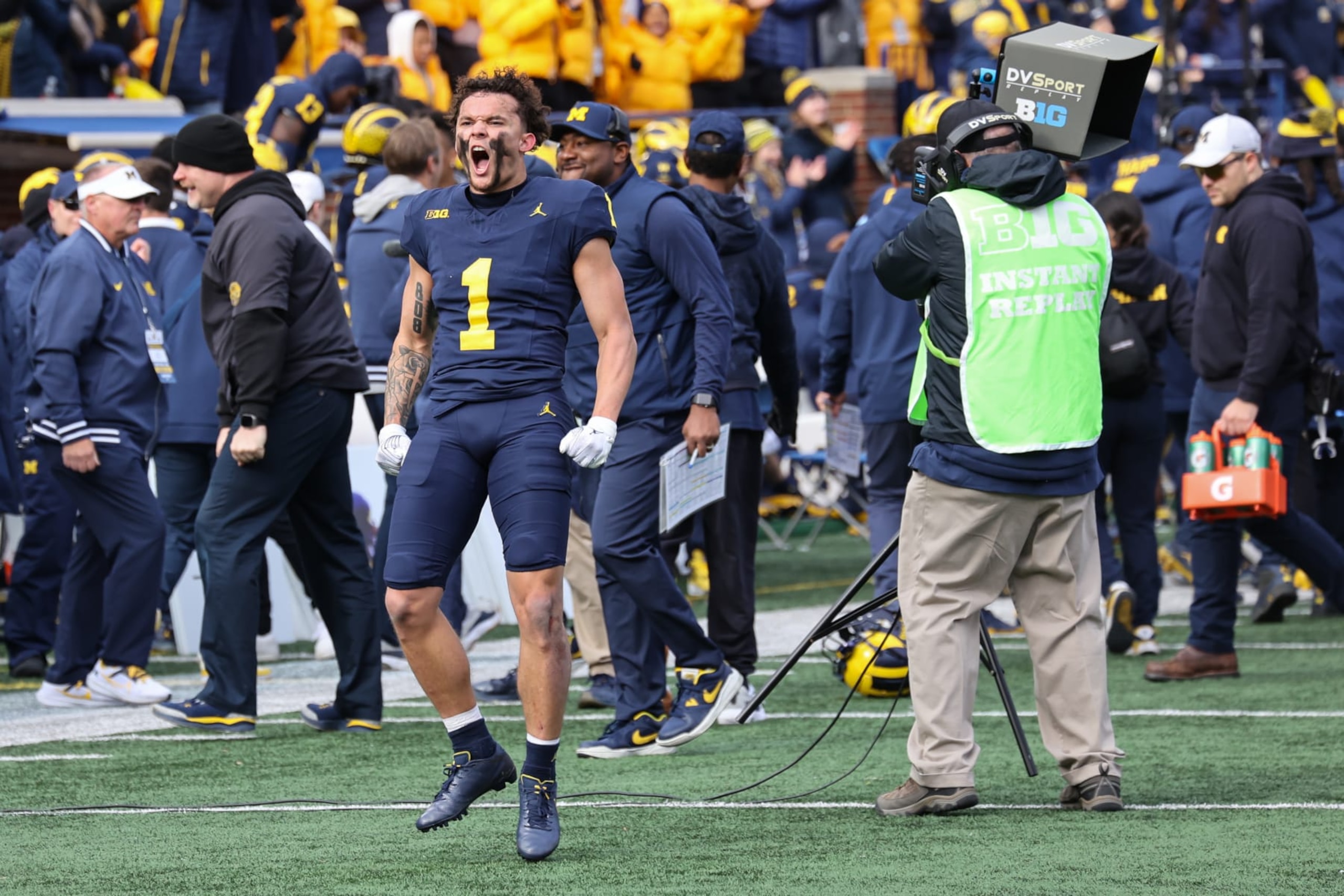 ANN ARBOR, MI - NOVEMBER 25: Michigan Wolverines wide receiver Roman Wilson (1) celebrates after his touchdown catch was reviewed and confirmed during a regular season Big Ten Conference college football game between the Ohio State Buckeyes and the Michigan Wolverines on November 25, 2023 at Michigan Stadium in Ann Arbor, Michigan. (Photo by Scott W. Grau/Icon Sportswire via Getty Images) ANN ARBOR, MI - NOVEMBER 25: Michigan Wolverines wide receiver Roman Wilson (1) celebrates after his touchdown catch was reviewed and confirmed during a regular season Big Ten Conference college football game between the Ohio State Buckeyes and the Michigan Wolverines on November 25, 2023 at Michigan Stadium in Ann Arbor, Michigan. (Photo by Scott W. Grau/Icon Sportswire via Getty Images)