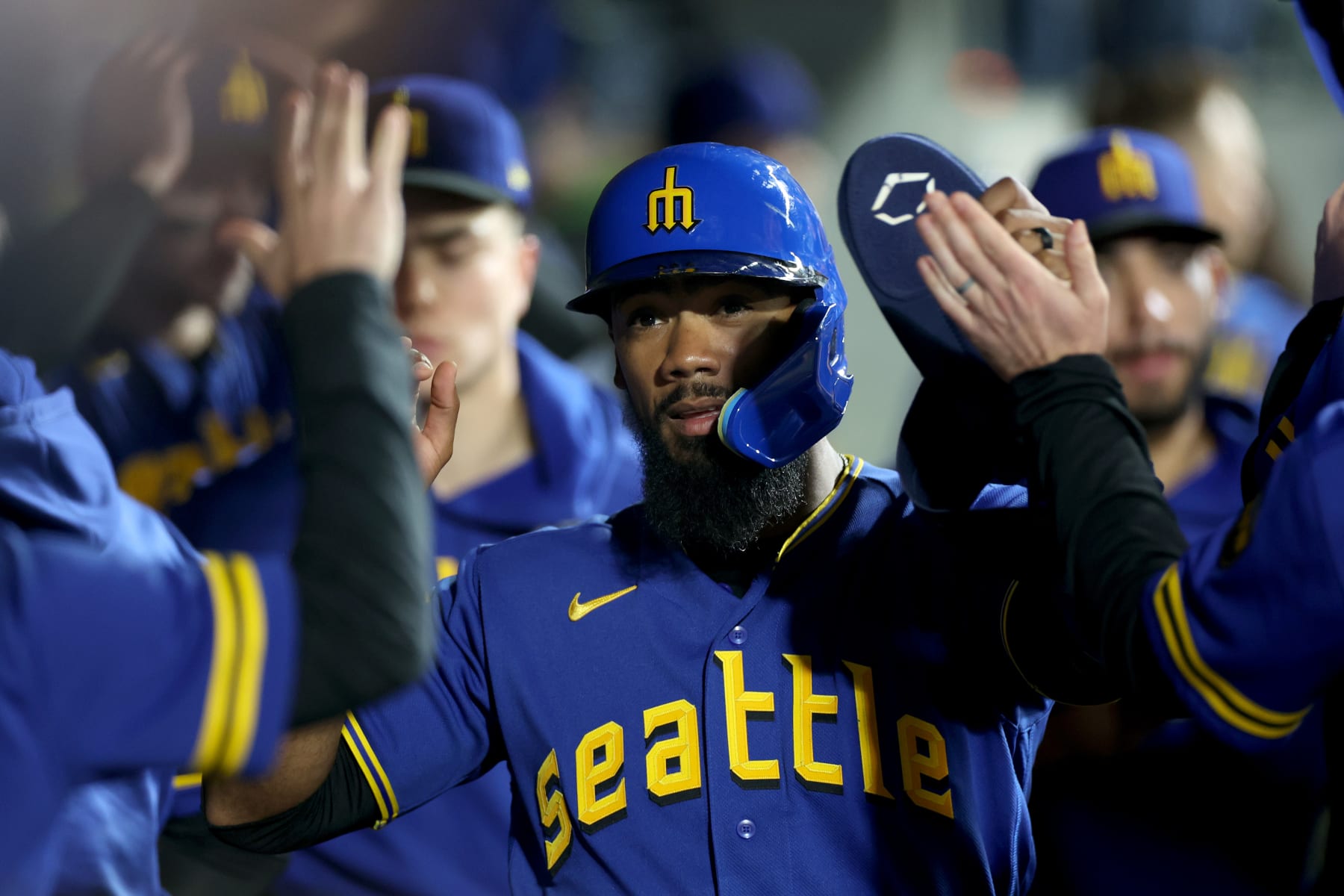 SEATTLE, WASHINGTON - SEPTEMBER 29: Teoscar Hernandez #35 of the Seattle Mariners celebrates a run against the Texas Rangers at T-Mobile Park on September 29, 2023 in Seattle, Washington. (Photo by Steph Chambers/Getty Images)