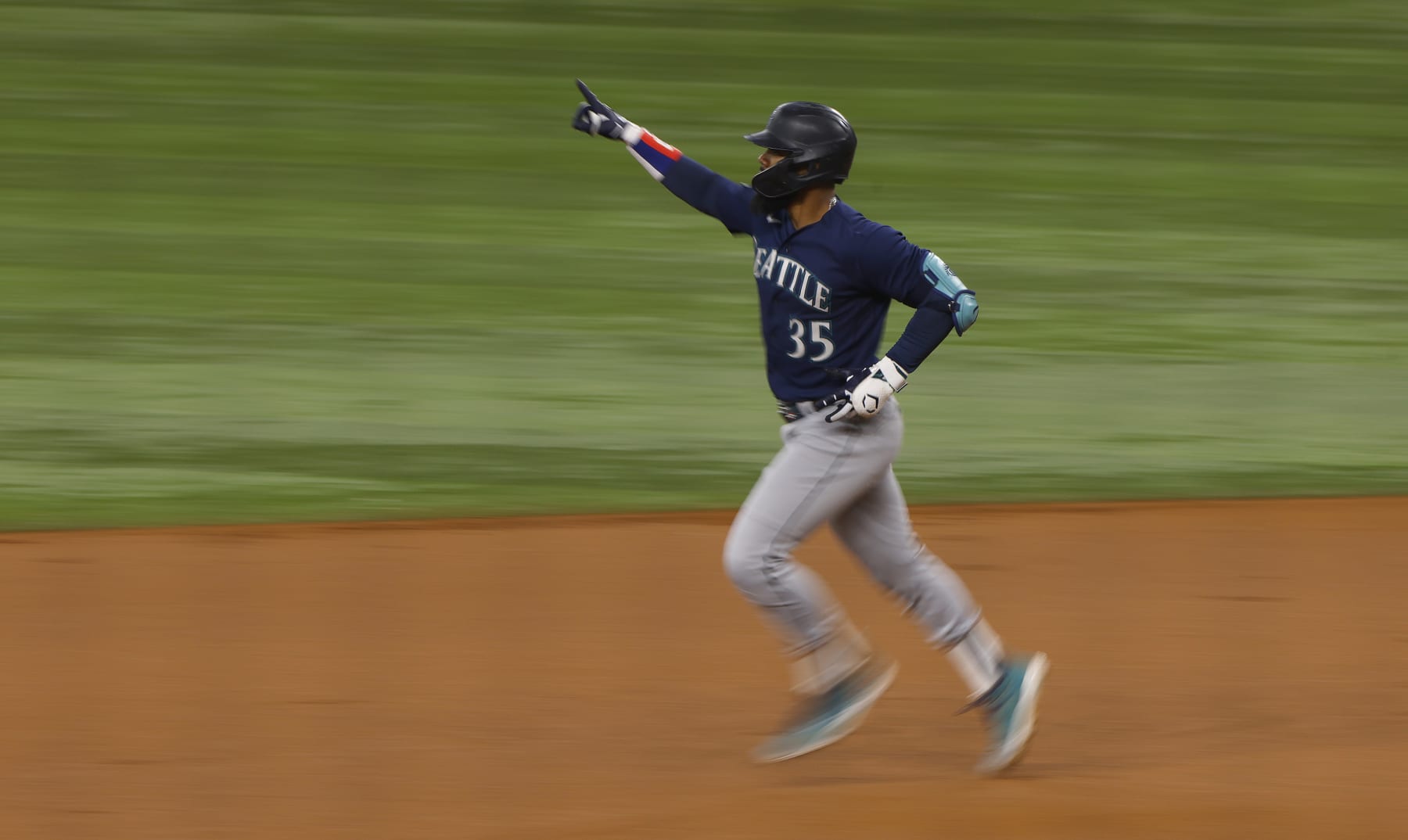 ARLINGTON, TX - SEPTEMBER 24: Teoscar Hernandez #35 of the Seattle Mariners celebrates after hitting a home run against the Texas Rangers at Globe Life Field on September 24, 2023 in Arlington, Texas. (Photo by Ron Jenkins/Getty Images)