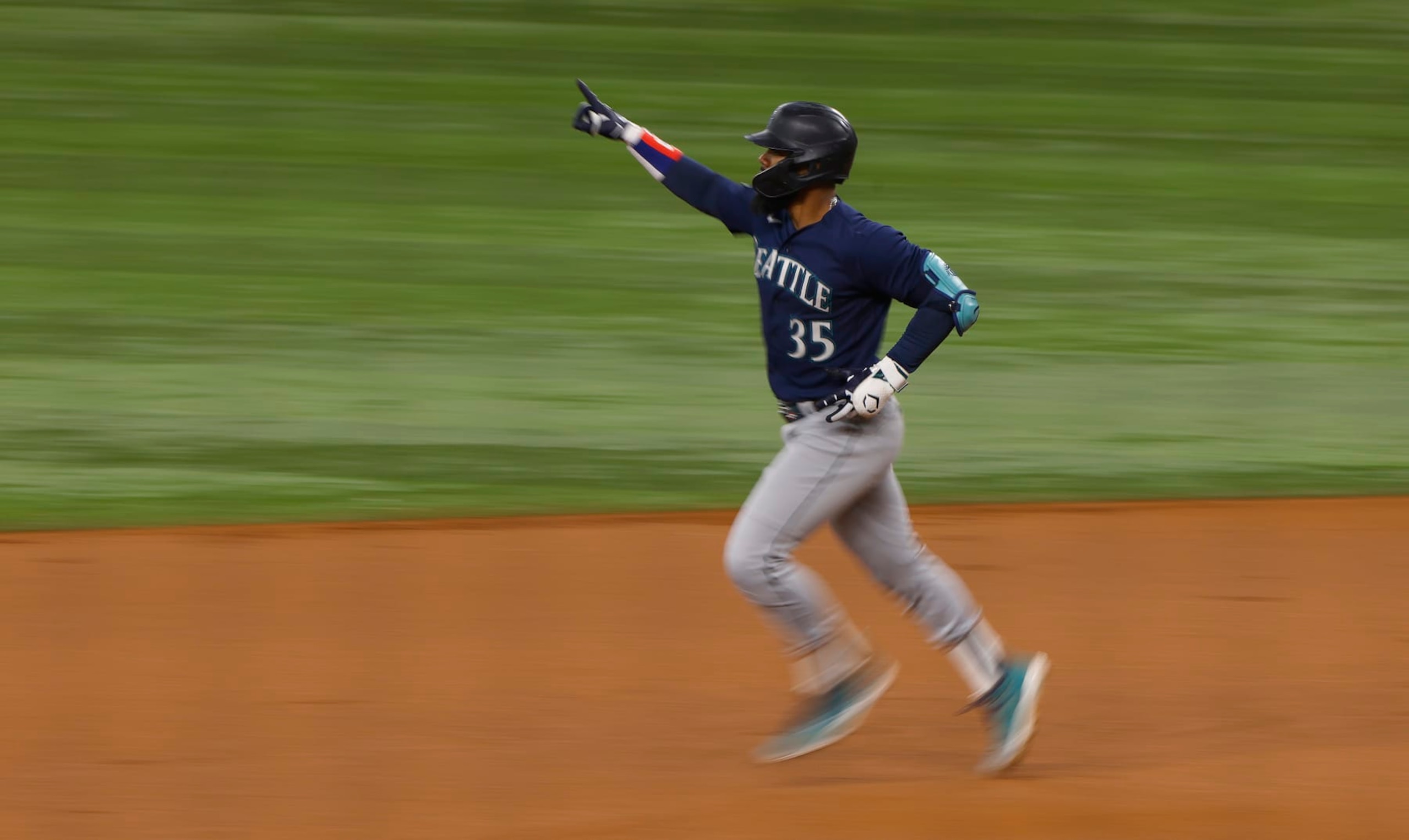 ARLINGTON, TX - SEPTEMBER 24: Teoscar Hernandez #35 of the Seattle Mariners celebrates after hitting a home run against the Texas Rangers at Globe Life Field on September 24, 2023 in Arlington, Texas. (Photo by Ron Jenkins/Getty Images)