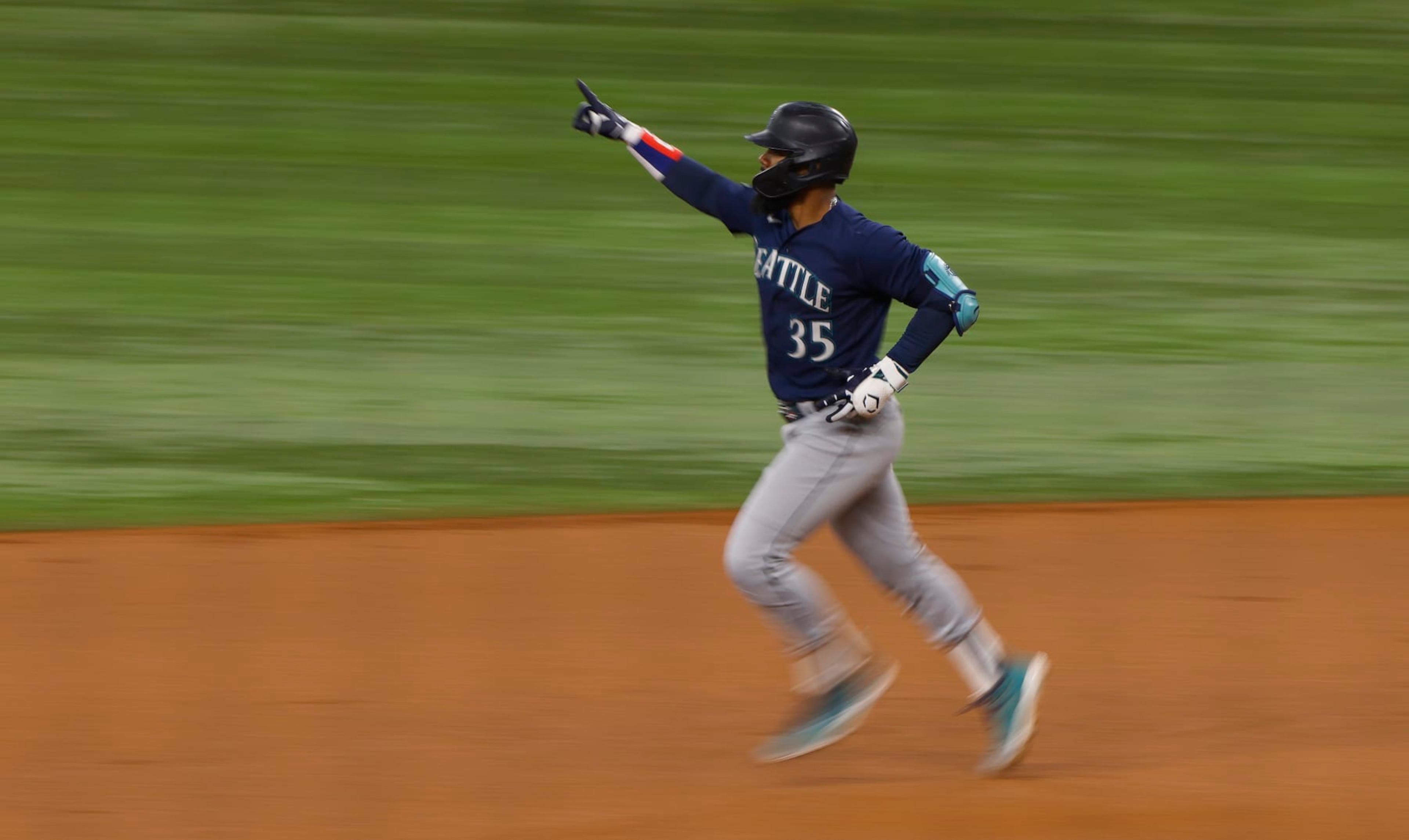 ARLINGTON, TX - SEPTEMBER 24: Teoscar Hernandez #35 of the Seattle Mariners celebrates after hitting a home run against the Texas Rangers at Globe Life Field on September 24, 2023 in Arlington, Texas. (Photo by Ron Jenkins/Getty Images)