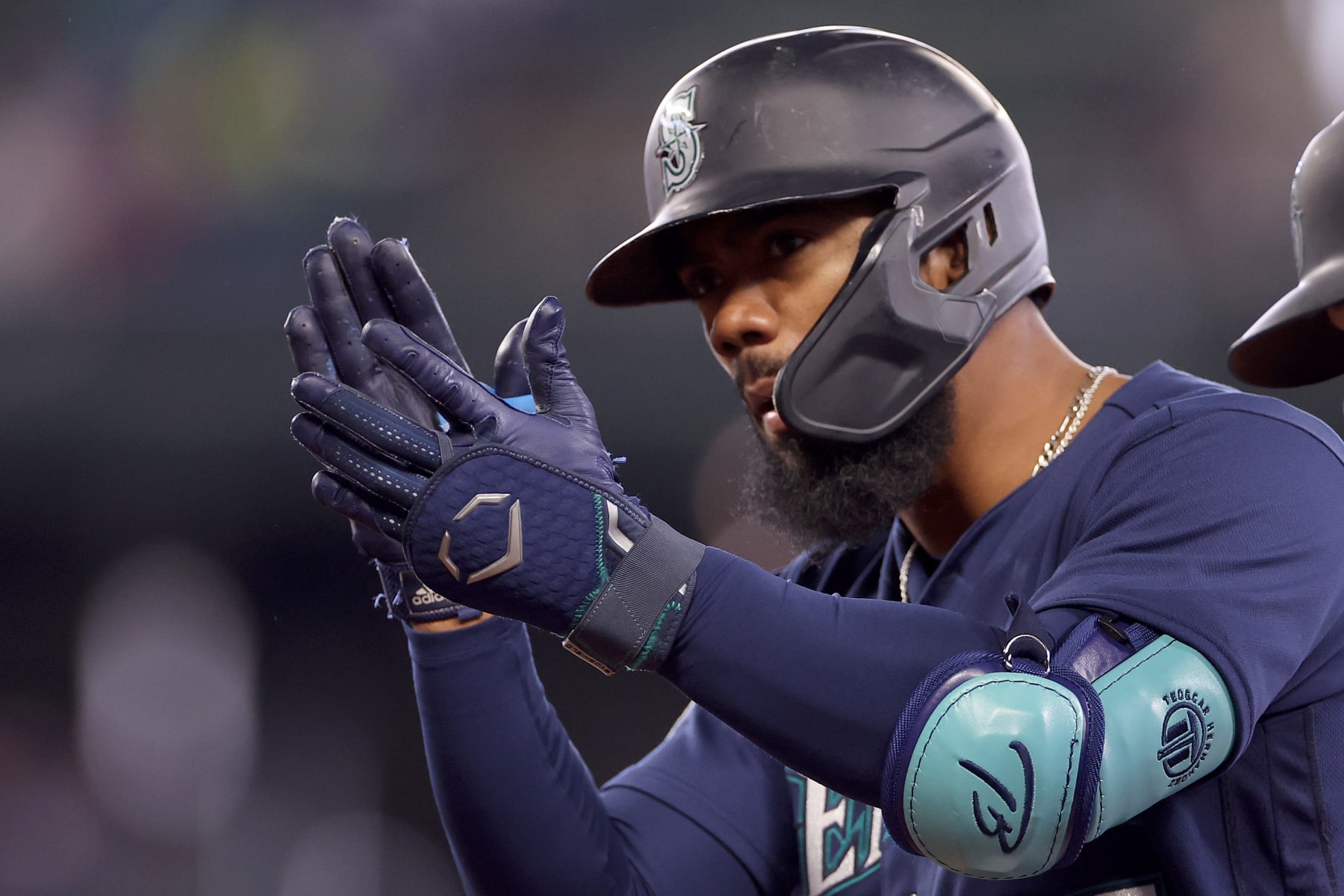 SEATTLE, WASHINGTON - APRIL 19: Teoscar Hernandez #35 of the Seattle Mariners celebrates his single during the ninth inning against the Milwaukee Brewers at T-Mobile Park on April 19, 2023 in Seattle, Washington. (Photo by Steph Chambers/Getty Images)