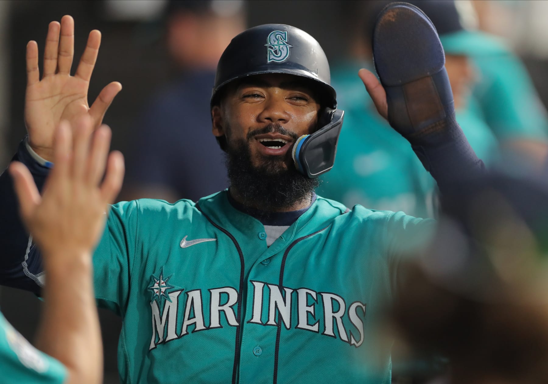 CHICAGO, IL - AUGUST 22: Seattle Mariners right fielder Teoscar Hernandez (35) is greeted in the dugout after scoring during a Major League Baseball game between the Seattle Mariners and the Chicago White Sox on August 22, 2023 at Guaranteed Rate Field in Chicago, IL. (Photo by Melissa Tamez/Icon Sportswire via Getty Images)