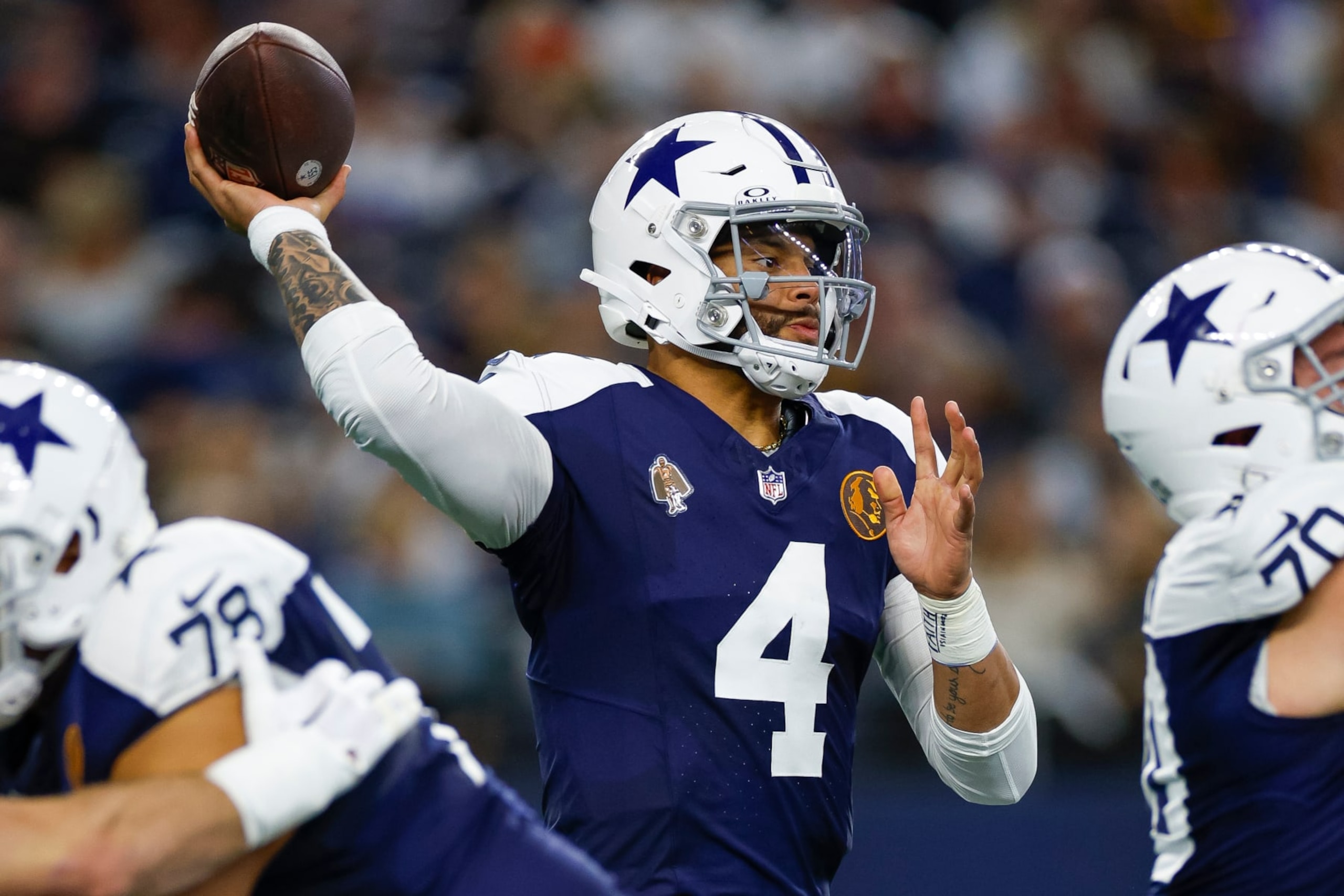 ARLINGTON, TEXAS - NOVEMBER 23: Dak Prescott #4 of the Dallas Cowboys throws a pass against the Washington Commanders during the first half at AT&T Stadium on November 23, 2023 in Arlington, Texas. (Photo by Brandon Sloter/Image Of Sport/Getty Images)