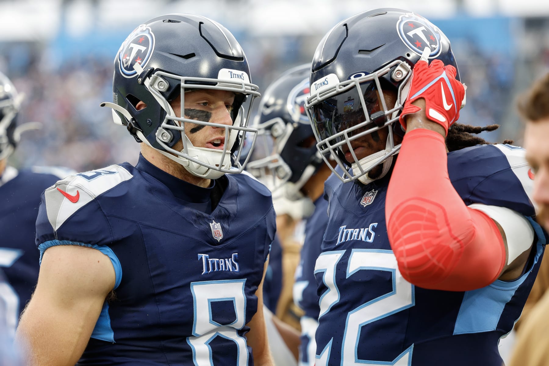NASHVILLE, TENNESSEE - NOVEMBER 26: Will Levis #8 of the Tennessee Titans and Derrick Henry #22 of the Tennessee Titans talk prior to a game against the Carolina Panthers at Nissan Stadium on November 26, 2023 in Nashville, Tennessee. (Photo by Wesley Hitt/Getty Images)