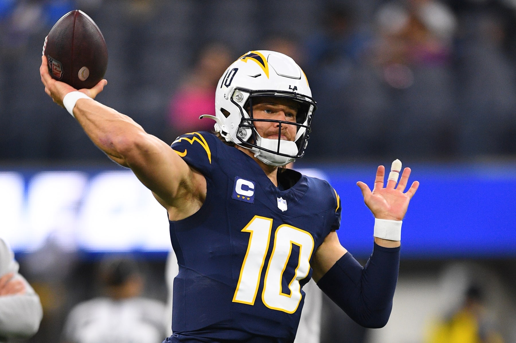INGLEWOOD, CA - NOVEMBER 26: Los Angeles Chargers quarterback Justin Herbert (10) throws a pass during warmups before the NFL regular season game between the Baltimore Ravens and the Los Angeles Chargers on November 26, 2023, at SoFi Stadium in Inglewood, CA. (Photo by Brian Rothmuller/Icon Sportswire via Getty Images)