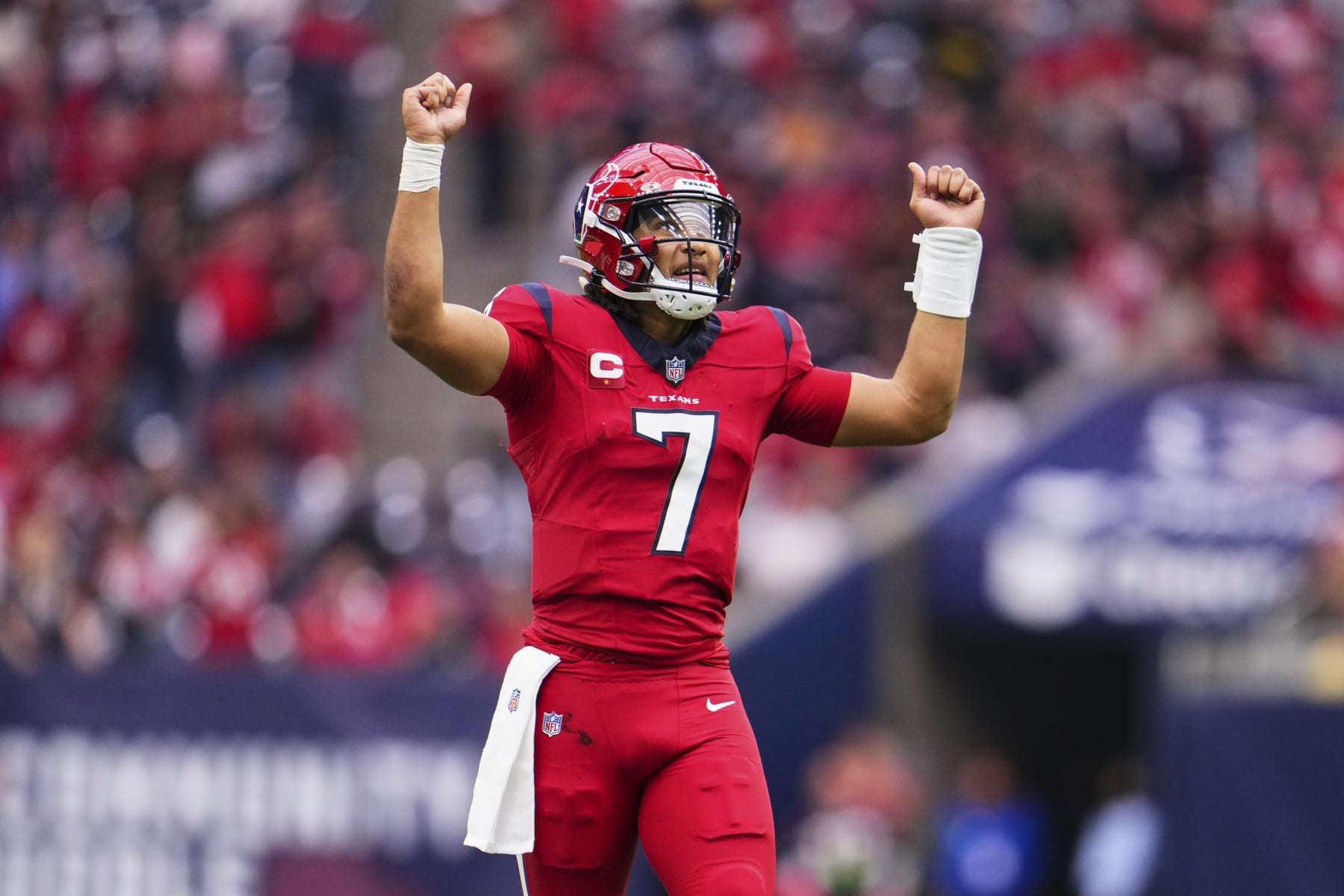 HOUSTON, TX - NOVEMBER 26: C.J. Stroud #7 of the Houston Texans reacts after a play against the Jacksonville Jaguars during the second half at NRG Stadium on November 26, 2023 in Houston, Texas. (Photo by Cooper Neill/Getty Images)