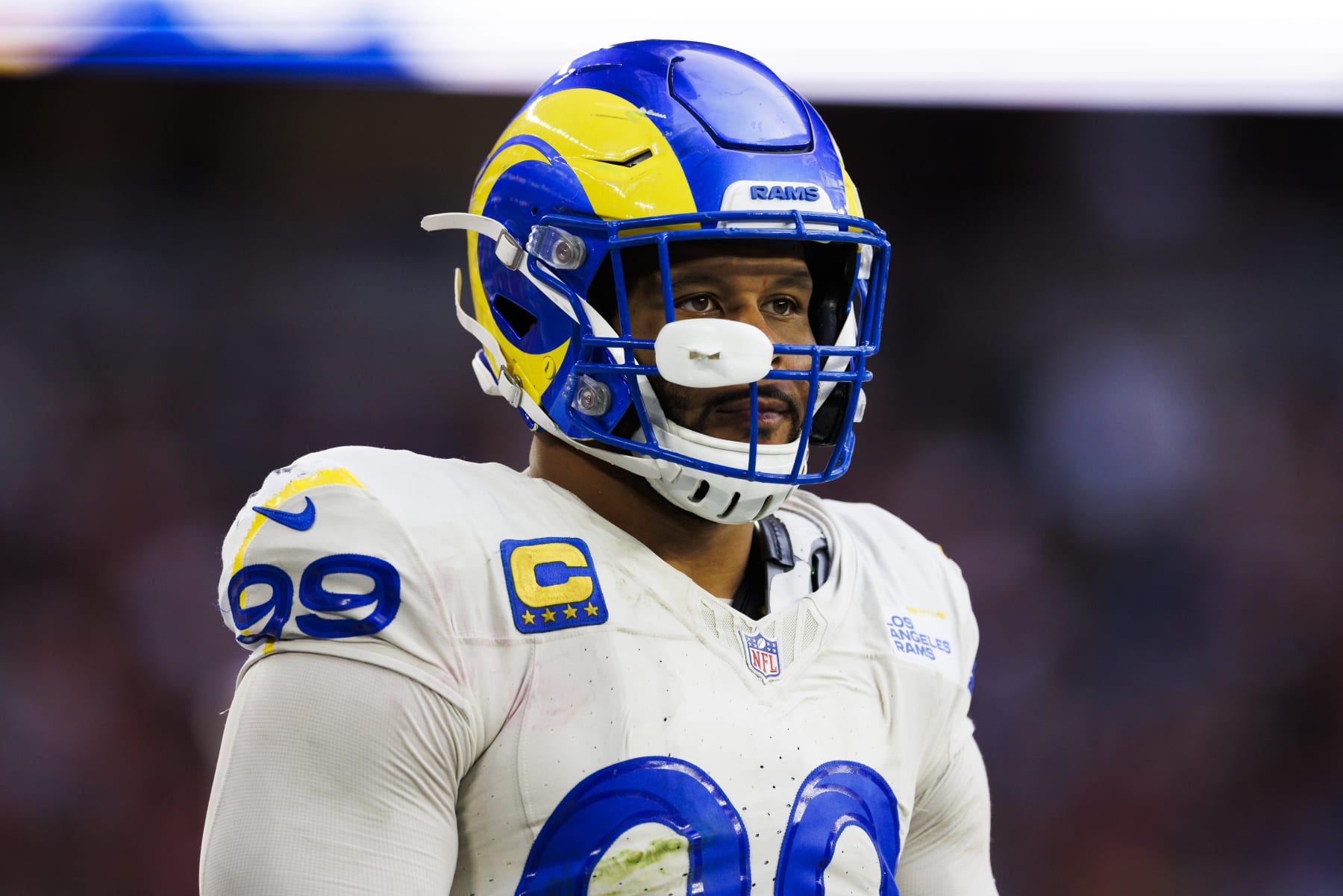 GLENDALE, ARIZONA - NOVEMBER 26: Aaron Donald #99 of the Los Angeles Rams on the sideline during a game against the Arizona Cardinals at State Farm Stadium on November 26, 2023 in Glendale, Arizona. (Photo by Ric Tapia/Getty Images)