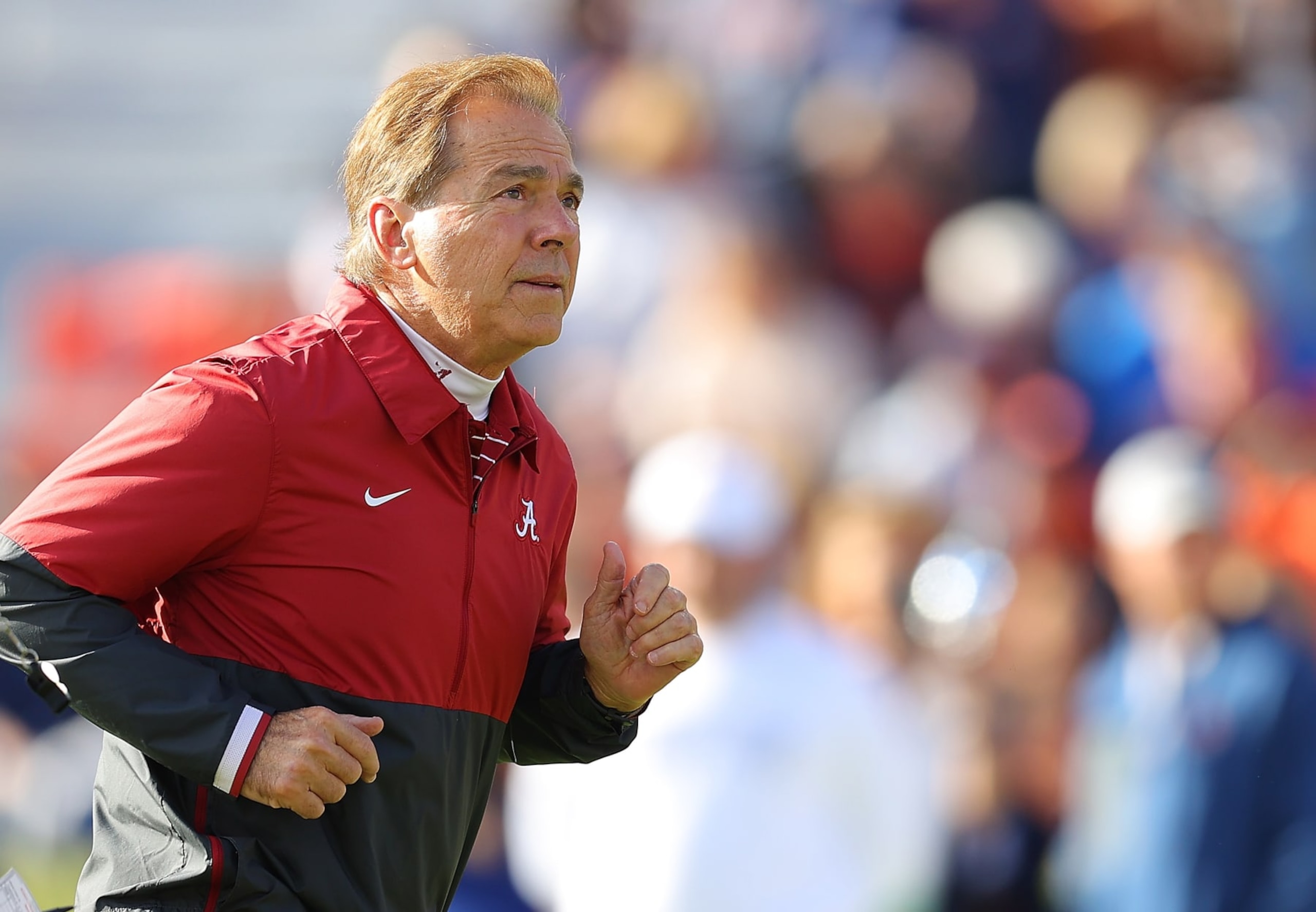 AUBURN, ALABAMA - NOVEMBER 25:  Head coach Nick Saban of the Alabama Crimson Tide runs down the field during warm up prior to the game against Auburn Tigers at Jordan-Hare Stadium on November 25, 2023 in Auburn, Alabama. (Photo by Kevin C. Cox/Getty Images)