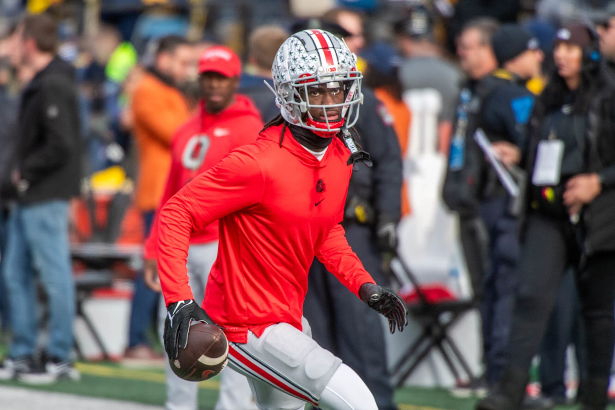 ANN ARBOR, MICHIGAN - NOVEMBER 25: Marvin Harrison Jr. #18 of the Ohio State Buckeyes is seen during warmups before a college football game against the Michigan Wolverines at Michigan Stadium on November 25, 2023 in Ann Arbor, Michigan. (Photo by Aaron J. Thornton/Getty Images) ANN ARBOR, MICHIGAN - NOVEMBER 25: Marvin Harrison Jr. #18 of the Ohio State Buckeyes is seen during warmups before a college football game against the Michigan Wolverines at Michigan Stadium on November 25, 2023 in Ann Arbor, Michigan. (Photo by Aaron J. Thornton/Getty Images)