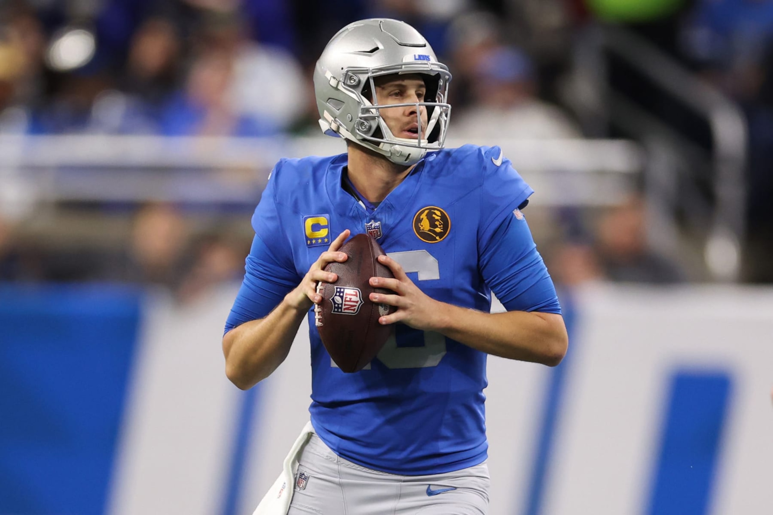 DETROIT, MICHIGAN - NOVEMBER 23: Jared Goff #16 of the Detroit Lions looks to pass against the Green Bay Packers during the first quarter of the game at Ford Field on November 23, 2023 in Detroit, Michigan. (Photo by Gregory Shamus/Getty Images)