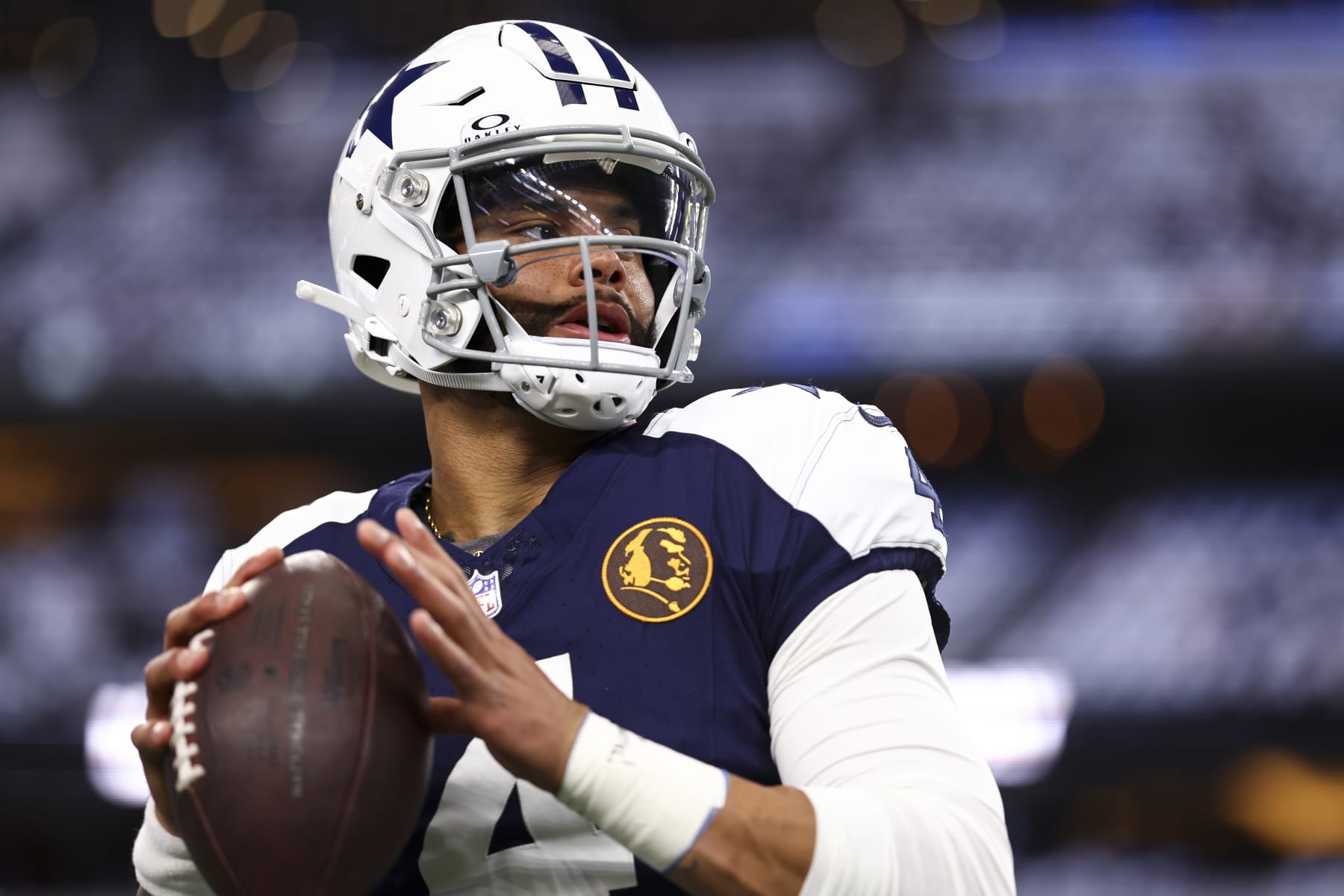 ARLINGTON, TX - NOVEMBER 23: Dak Prescott #4 of the Dallas Cowboys warms up prior to an NFL football game against the Washington Commanders at AT&T Stadium on November 23, 2023 in Arlington, Texas. (Photo by Kevin Sabitus/Getty Images)