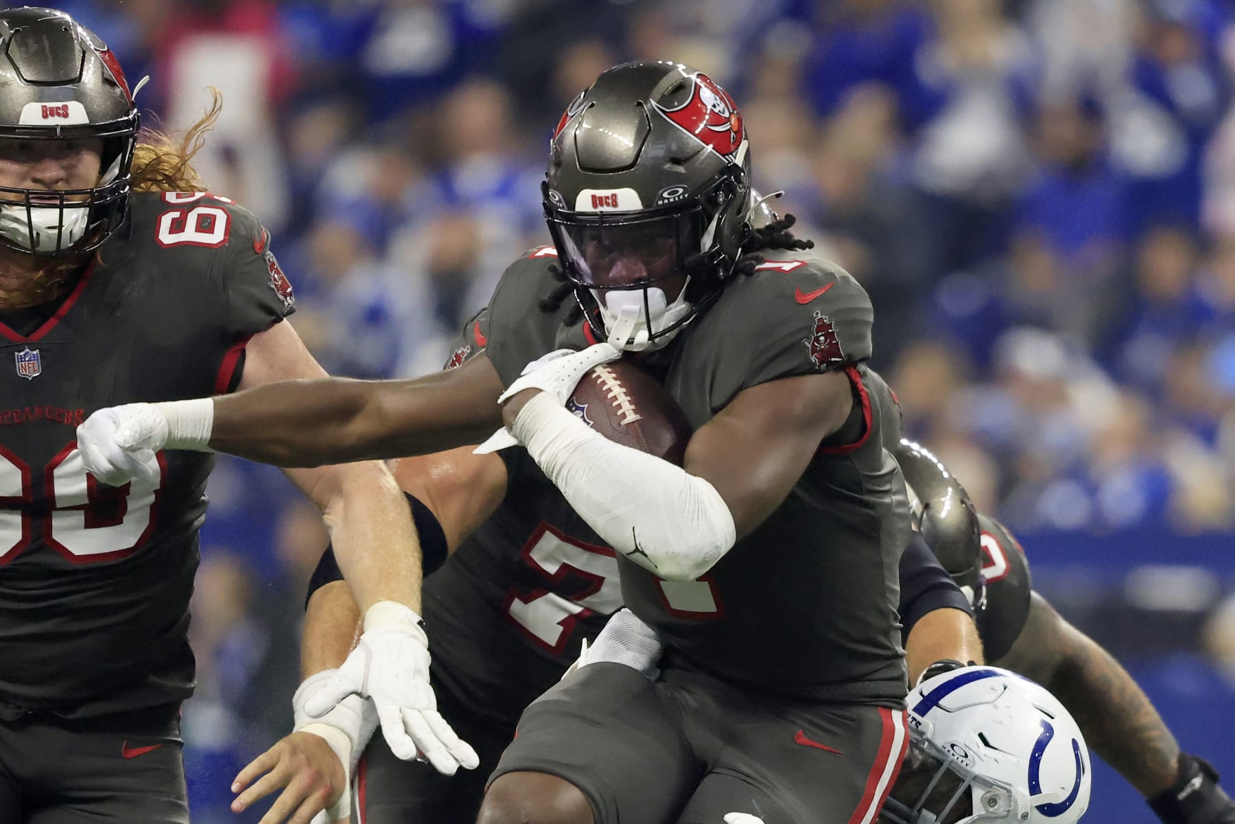 INDIANAPOLIS, INDIANA - NOVEMBER 26: Rachaad White #1 of the Tampa Bay Buccaneers runs the ball in the game against the Indianapolis Colts at Lucas Oil Stadium on November 26, 2023 in Indianapolis, Indiana. (Photo by Justin Casterline/Getty Images)