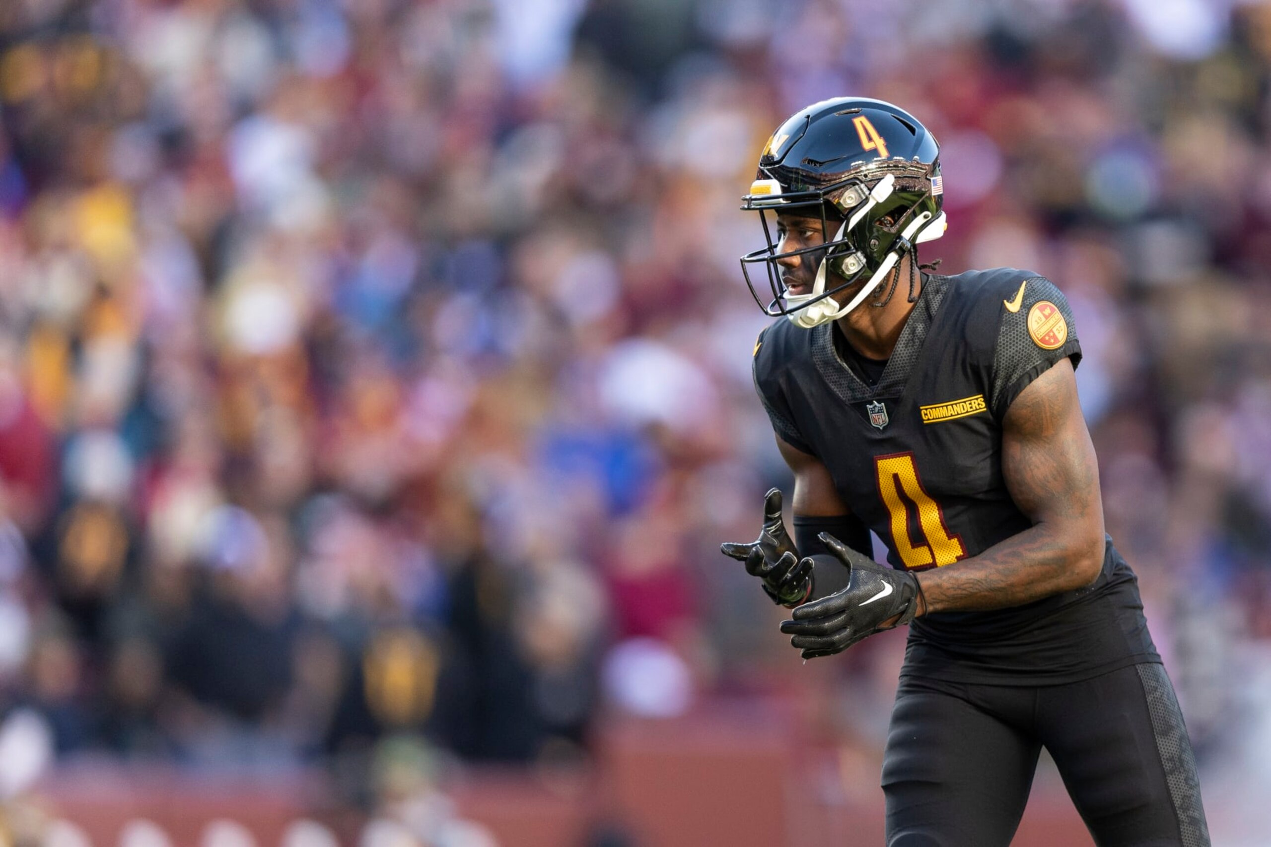 LANDOVER, MARYLAND - NOVEMBER 19: Curtis Samuel #4 of the Washington Commanders lines up during an NFL football game between the Washington Commanders and the New York Giants at FedExField on November 19, 2023 in Landover, Maryland. (Photo by Michael Owens/Getty Images)